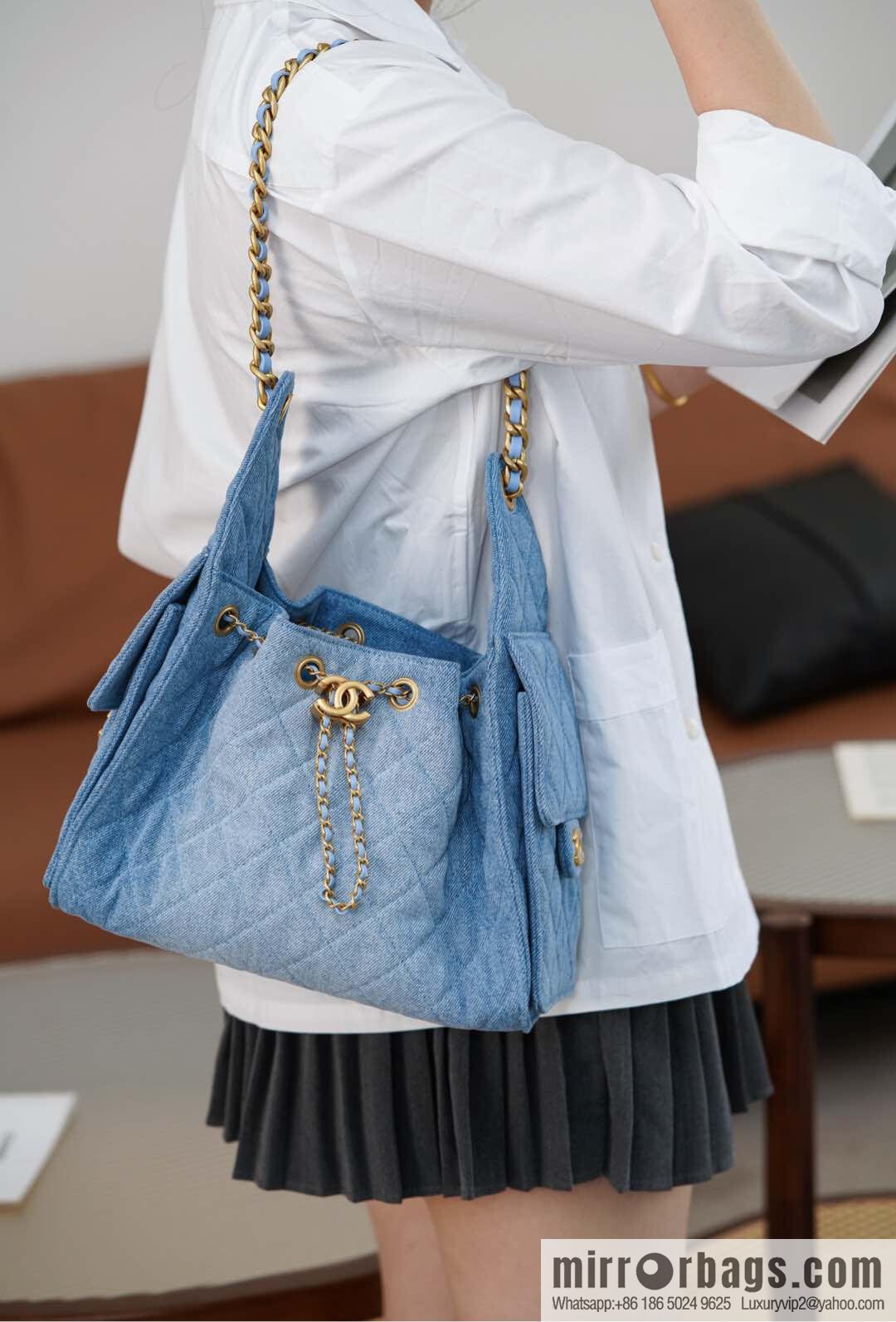 ππ‘ππ§ππ₯ πππ¬ π¬π¦ππ₯π₯ π‘π¨ππ¨ Drawstring Bucket Bag, Denim Blue π Small AS5293