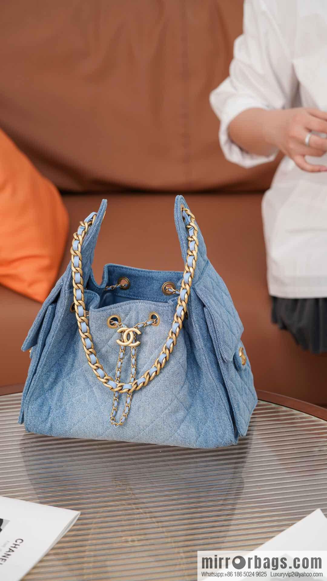 ππ‘ππ§ππ₯ πππ¬ π¬π¦ππ₯π₯ π‘π¨ππ¨ Drawstring Bucket Bag, Denim Blue π Small AS5293