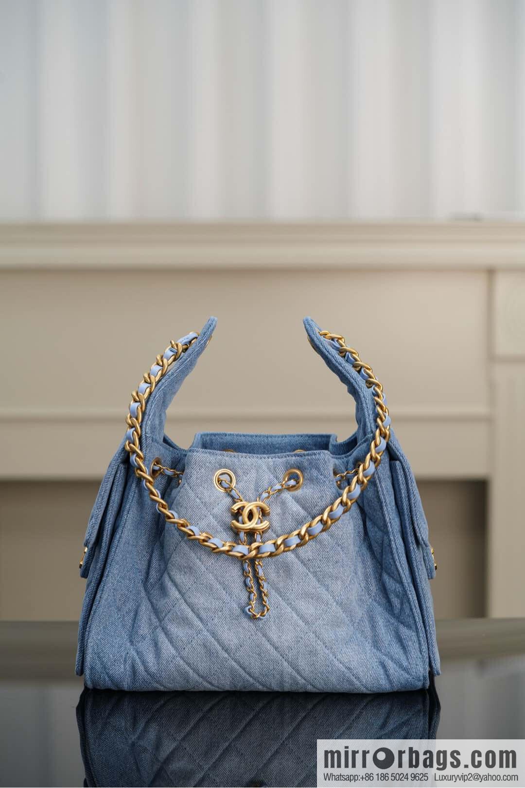 ππ‘ππ§ππ₯ πππ¬ π¬π¦ππ₯π₯ π‘π¨ππ¨ Drawstring Bucket Bag, Denim Blue π Small AS5293