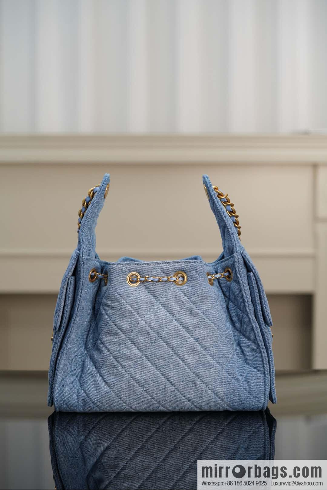 ππ‘ππ§ππ₯ πππ¬ π¬π¦ππ₯π₯ π‘π¨ππ¨ Drawstring Bucket Bag, Denim Blue π Small AS5293