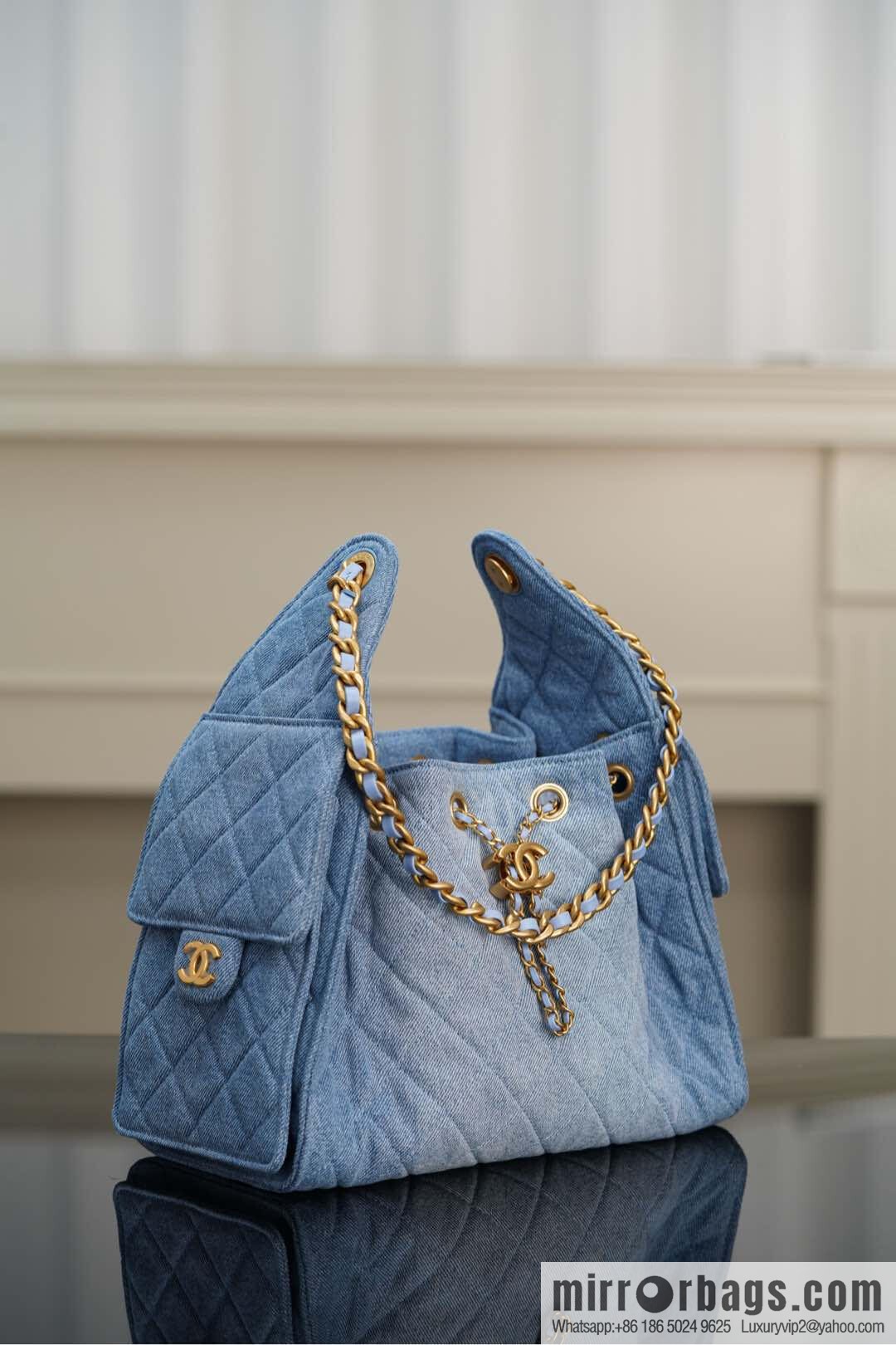ππ‘ππ§ππ₯ πππ¬ π¬π¦ππ₯π₯ π‘π¨ππ¨ Drawstring Bucket Bag, Denim Blue π Small AS5293