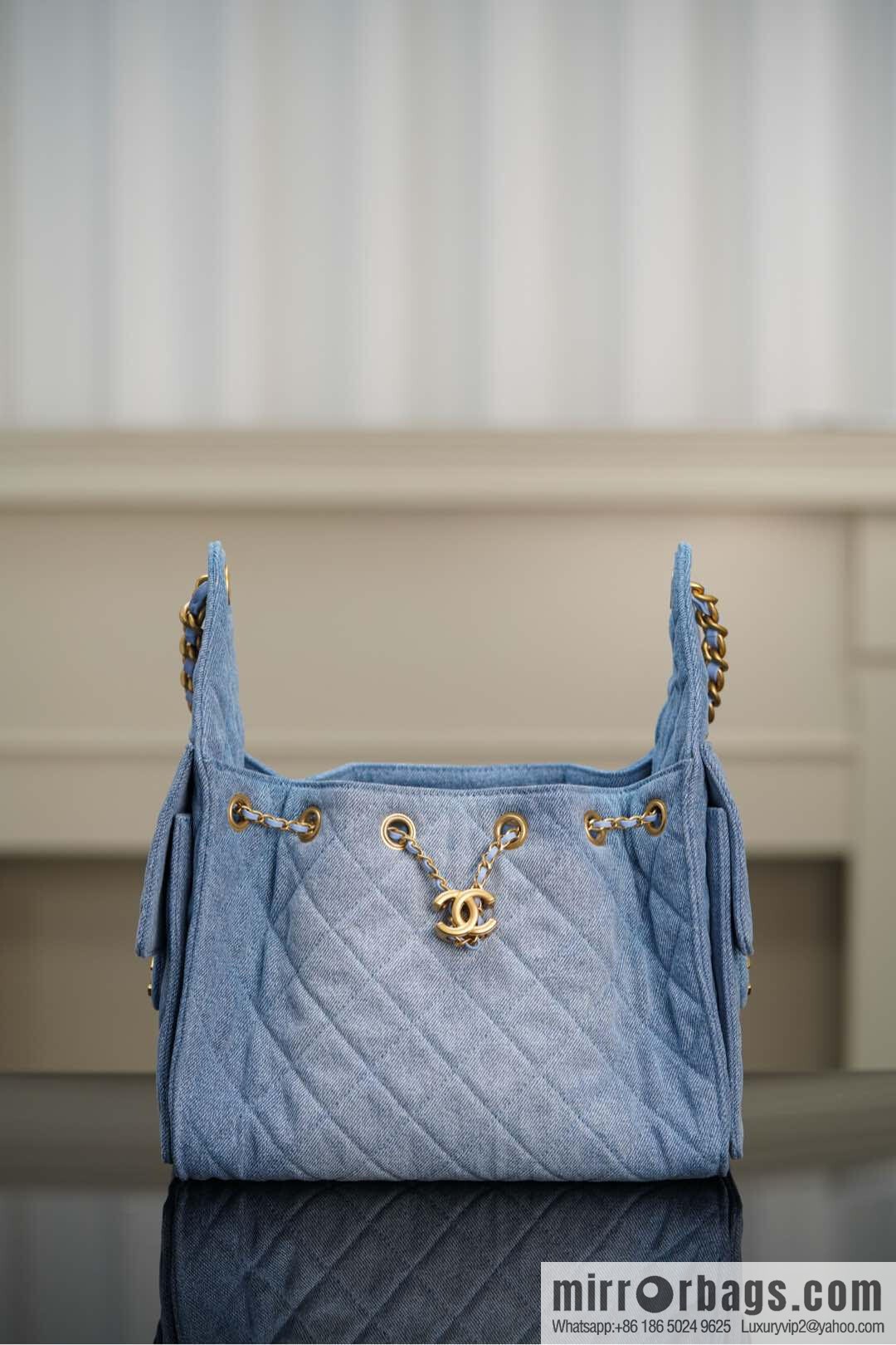 ππ‘ππ§ππ₯ πππ¬ π¬π¦ππ₯π₯ π‘π¨ππ¨ Drawstring Bucket Bag, Denim Blue π Small AS5293