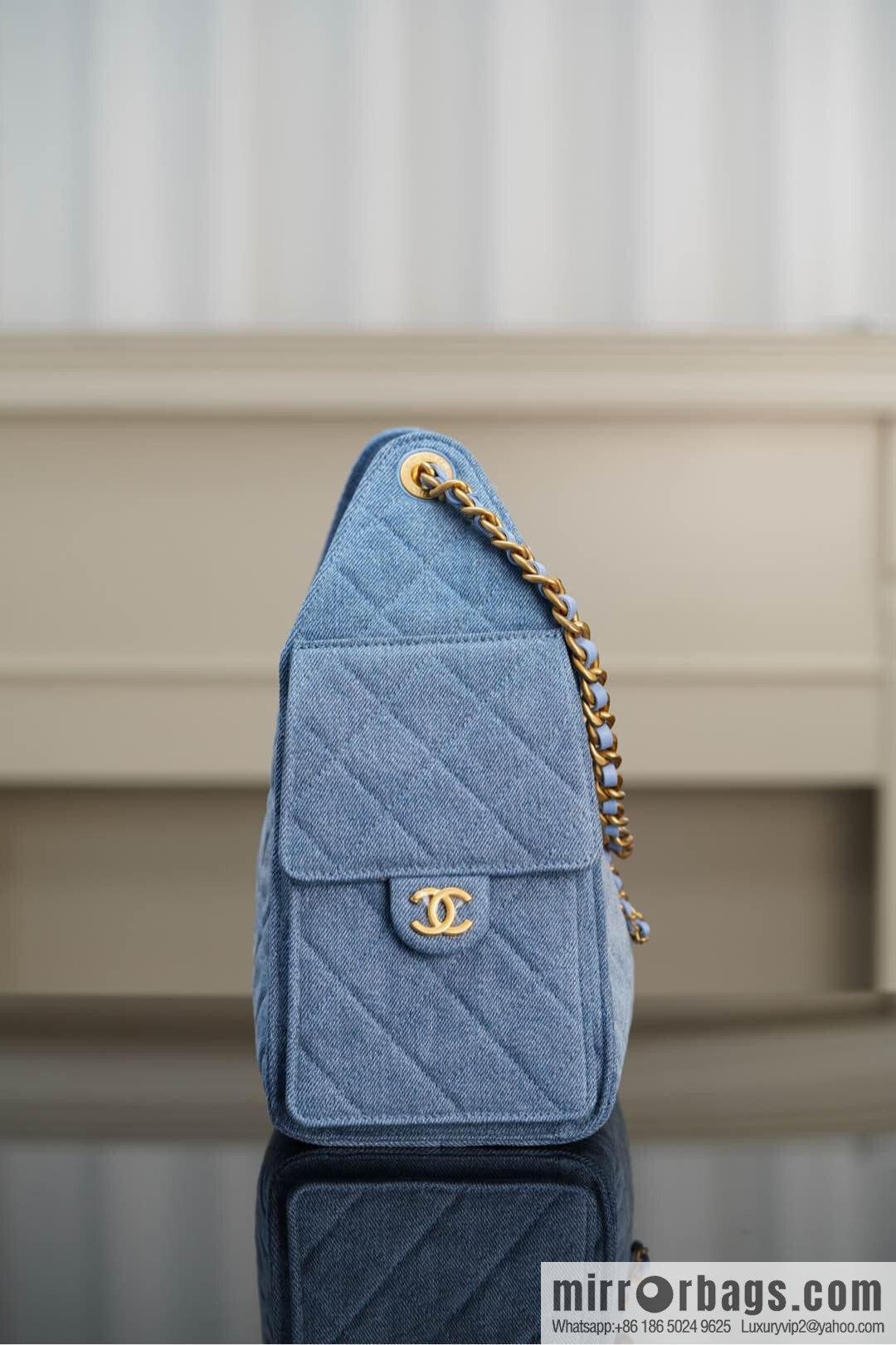 ππ‘ππ§ππ₯ πππ¬ π¬π¦ππ₯π₯ π‘π¨ππ¨ Drawstring Bucket Bag, Denim Blue π Small AS5293