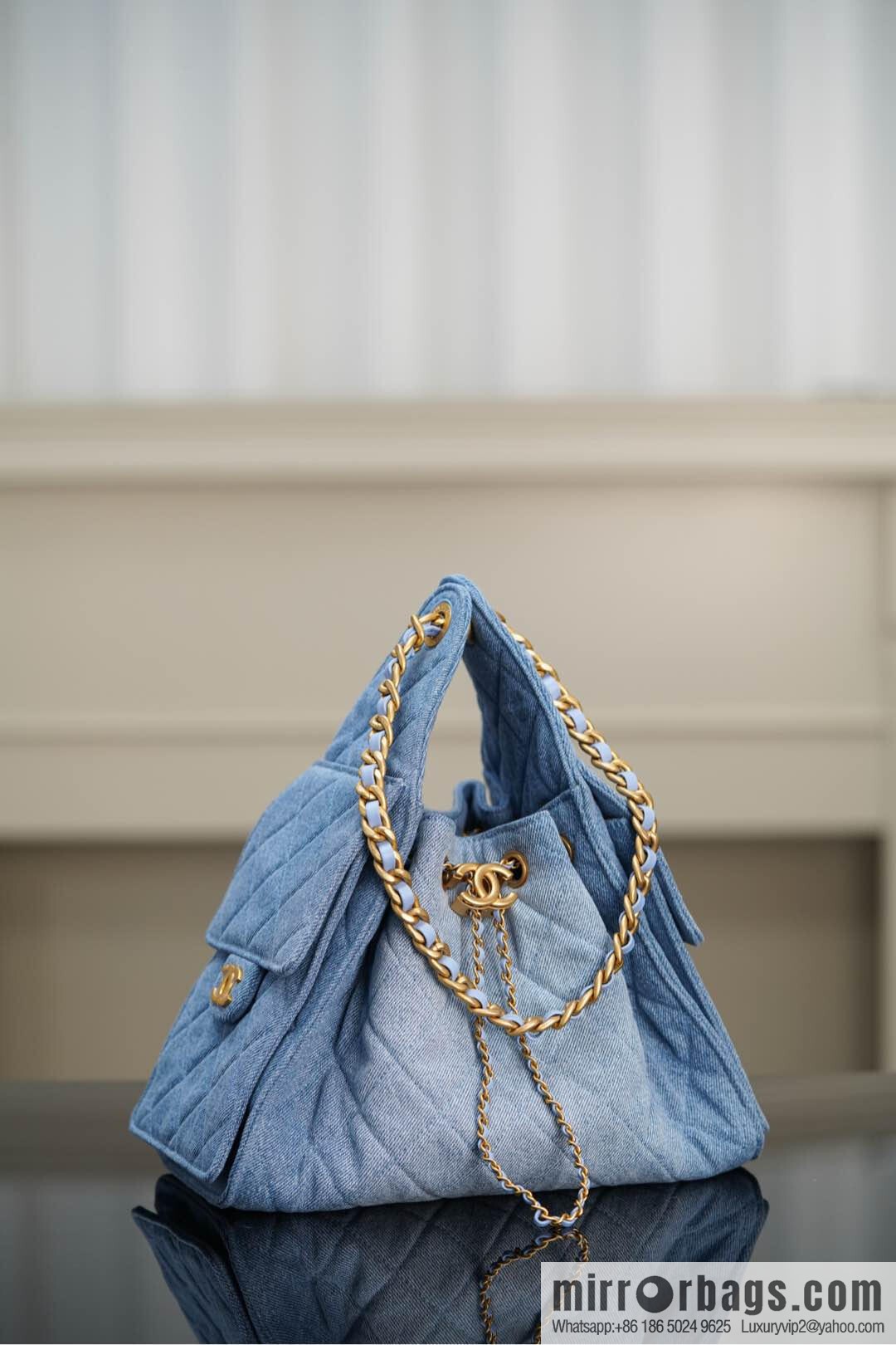 ππ‘ππ§ππ₯ πππ¬ π¬π¦ππ₯π₯ π‘π¨ππ¨ Drawstring Bucket Bag, Denim Blue π Small AS5293