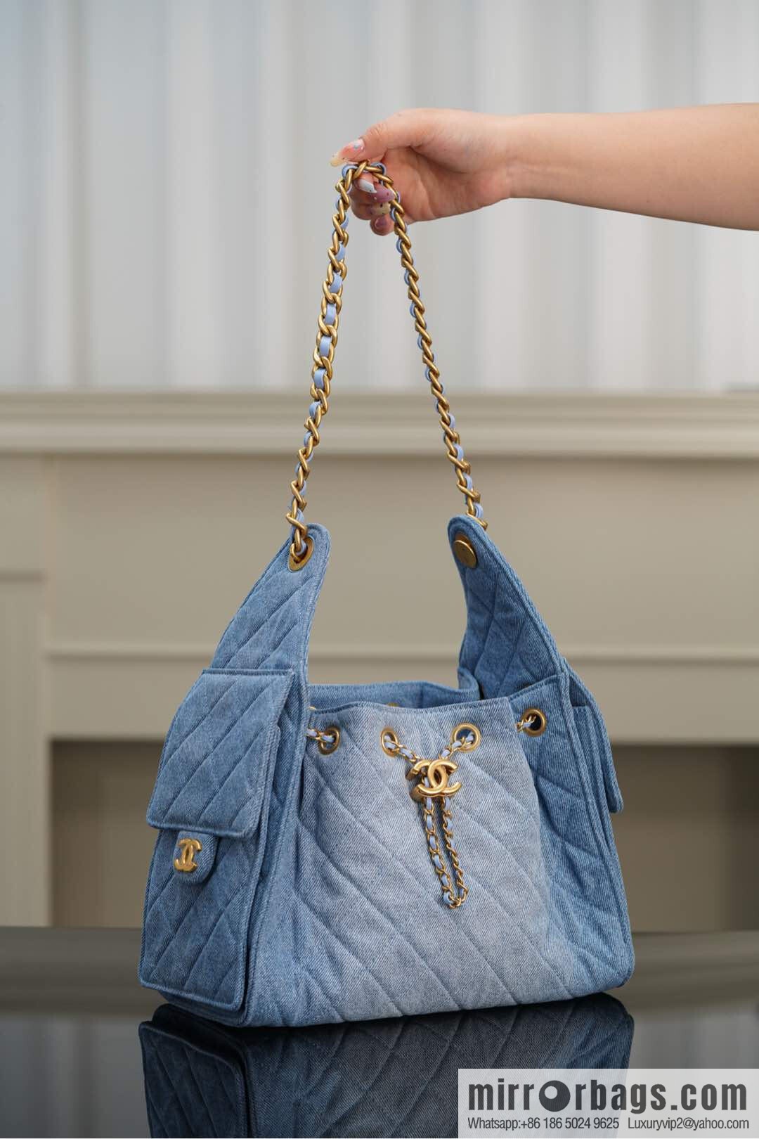 ππ‘ππ§ππ₯ πππ¬ π¬π¦ππ₯π₯ π‘π¨ππ¨ Drawstring Bucket Bag, Denim Blue π Small AS5293