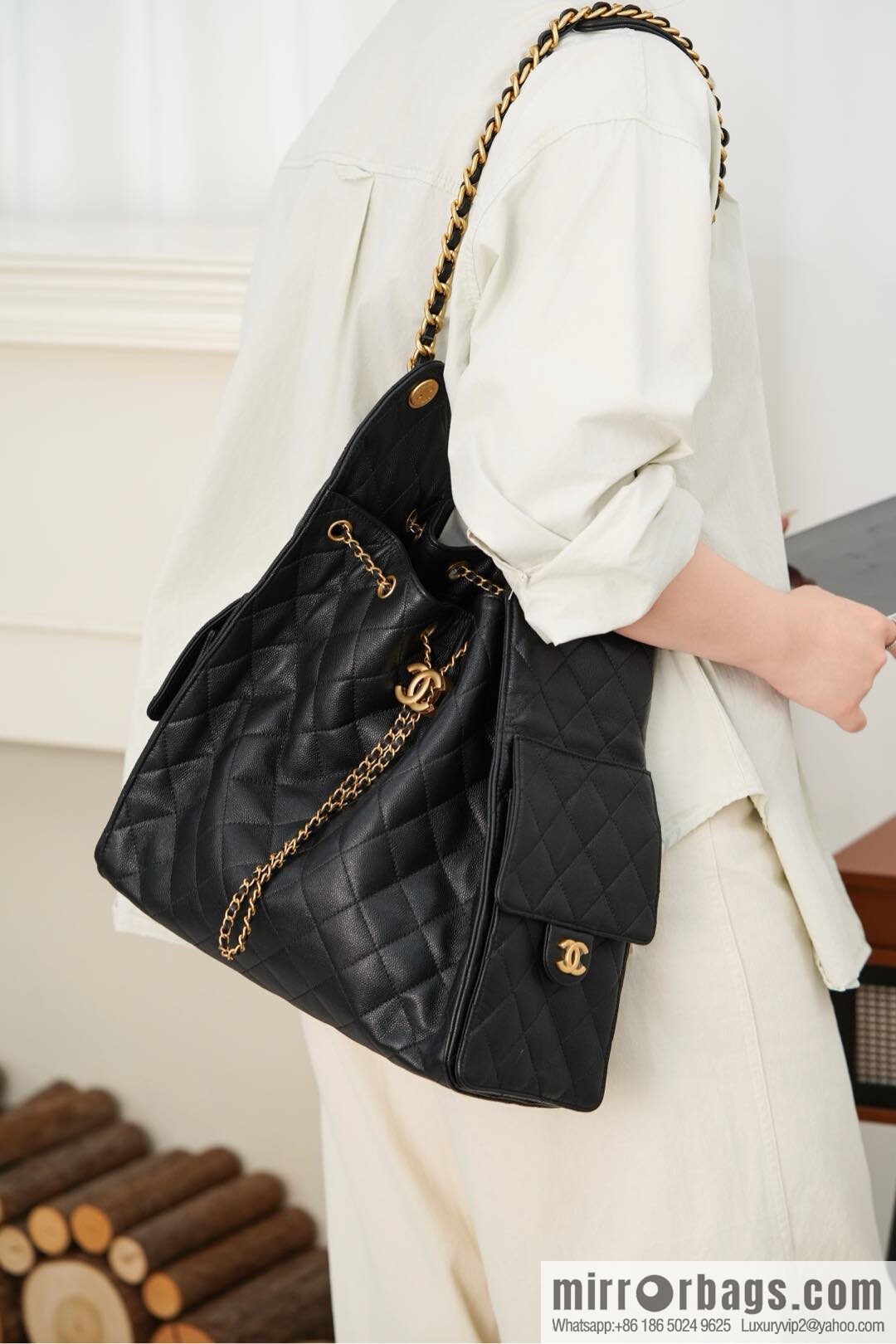 ππ‘ππ§ππ₯ πππ¬ π‘π¨ππ¨ πππ Drawstring Bucket Bag, Black Gold Caviar, Large βοΈ AS5311