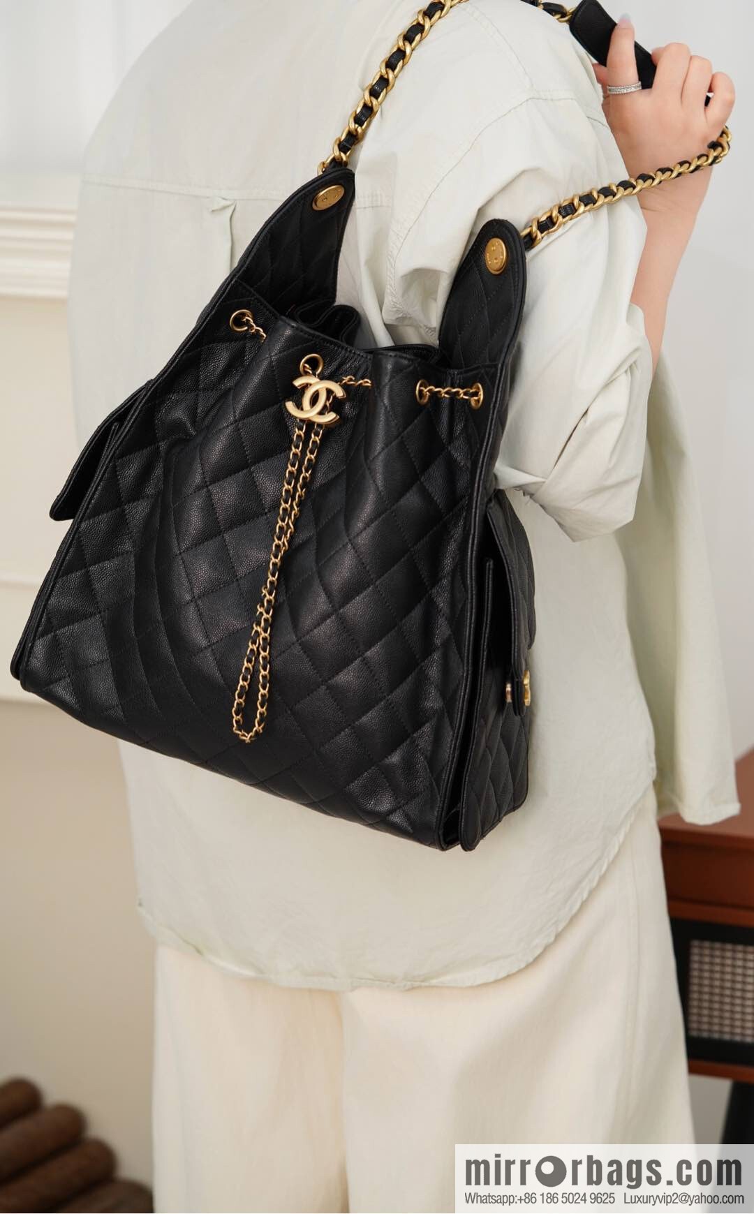 ππ‘ππ§ππ₯ πππ¬ π‘π¨ππ¨ πππ Drawstring Bucket Bag, Black Gold Caviar, Large βοΈ AS5311