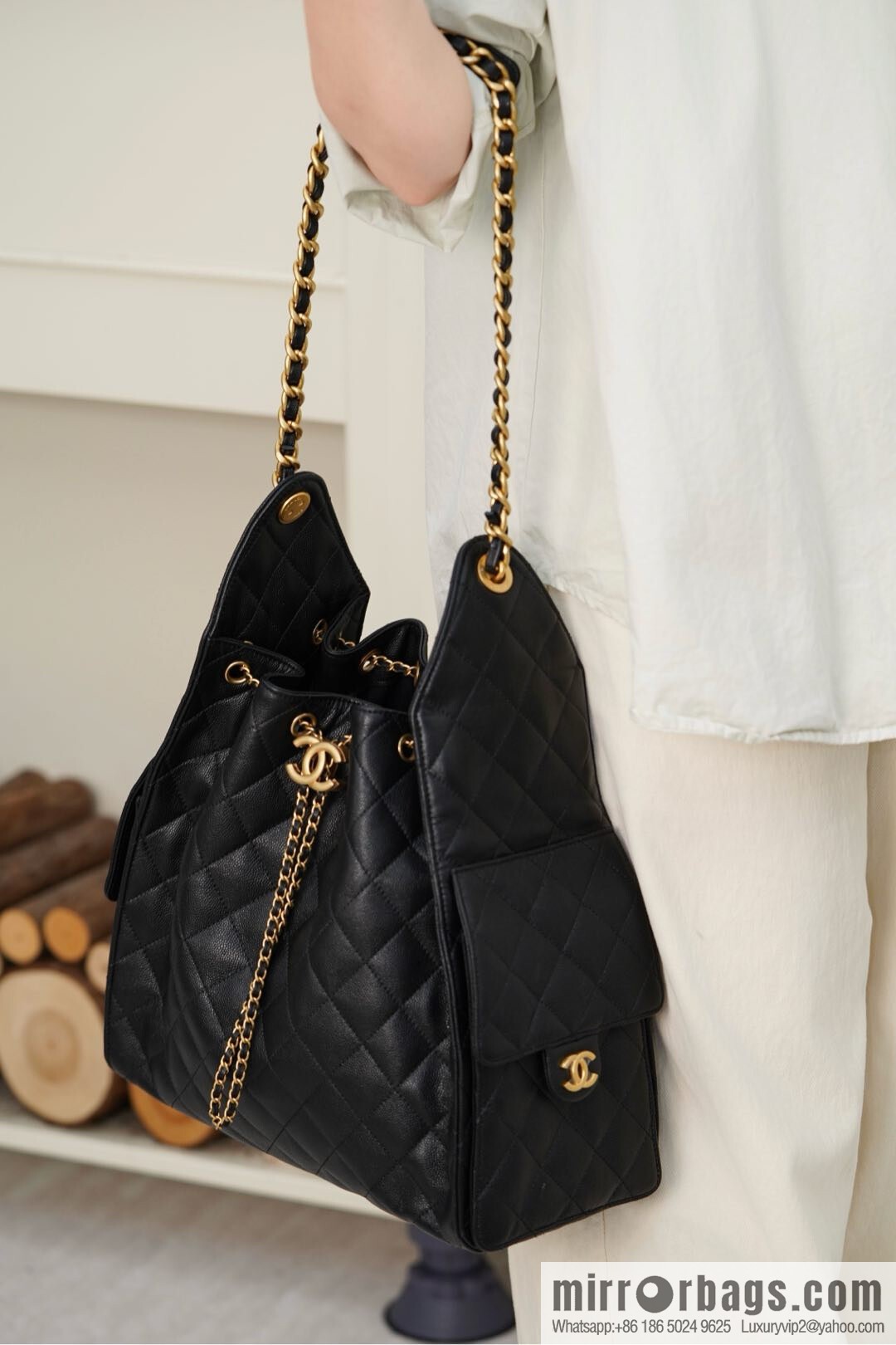ππ‘ππ§ππ₯ πππ¬ π‘π¨ππ¨ πππ Drawstring Bucket Bag, Black Gold Caviar, Large βοΈ AS5311