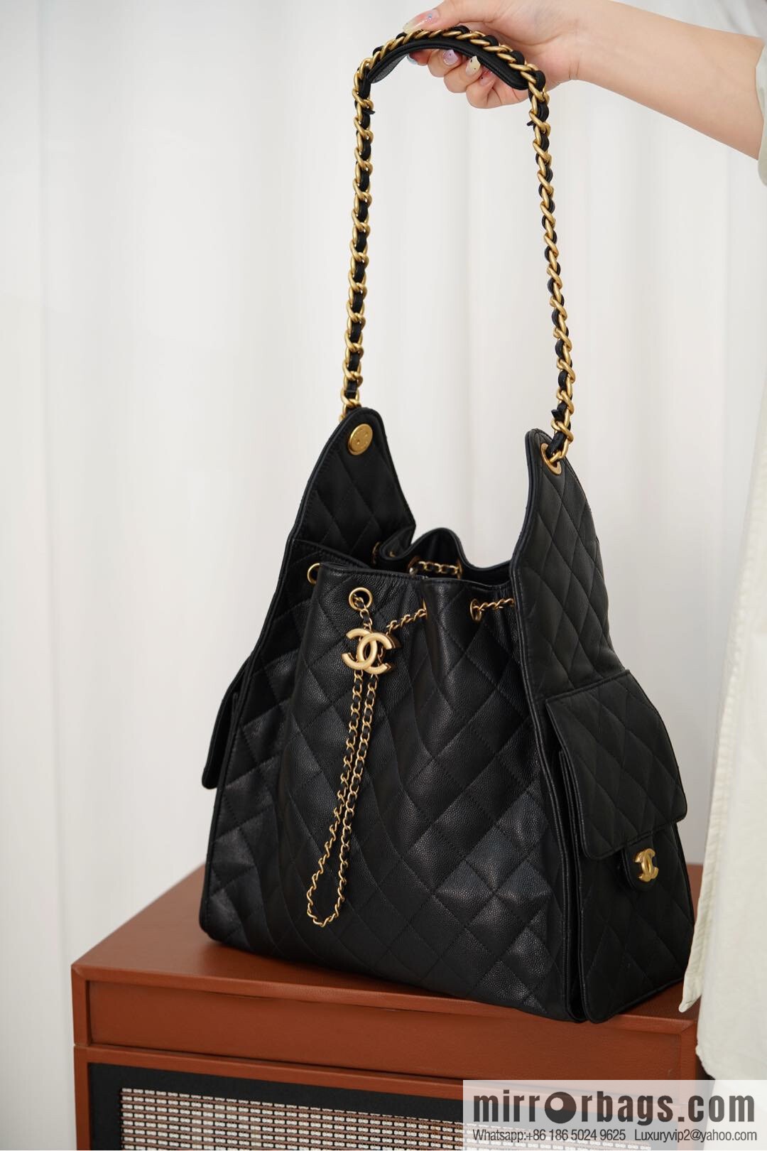 ππ‘ππ§ππ₯ πππ¬ π‘π¨ππ¨ πππ Drawstring Bucket Bag, Black Gold Caviar, Large βοΈ AS5311