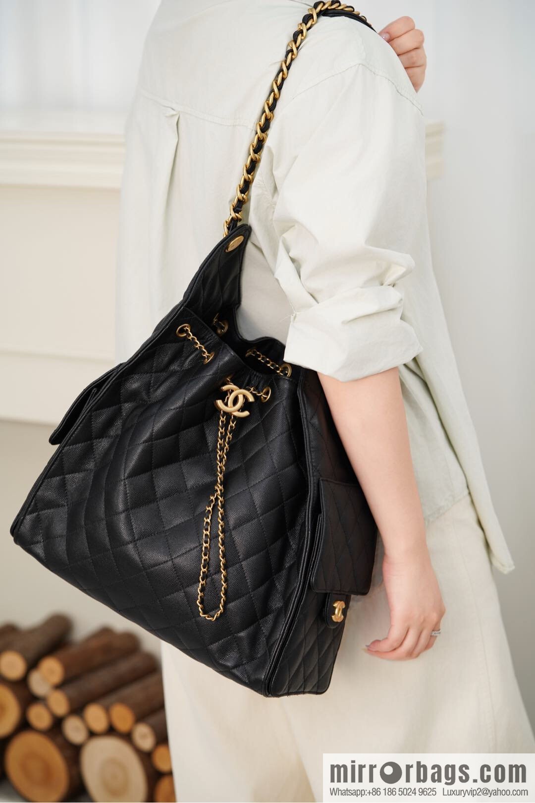 ππ‘ππ§ππ₯ πππ¬ π‘π¨ππ¨ πππ Drawstring Bucket Bag, Black Gold Caviar, Large βοΈ AS5311