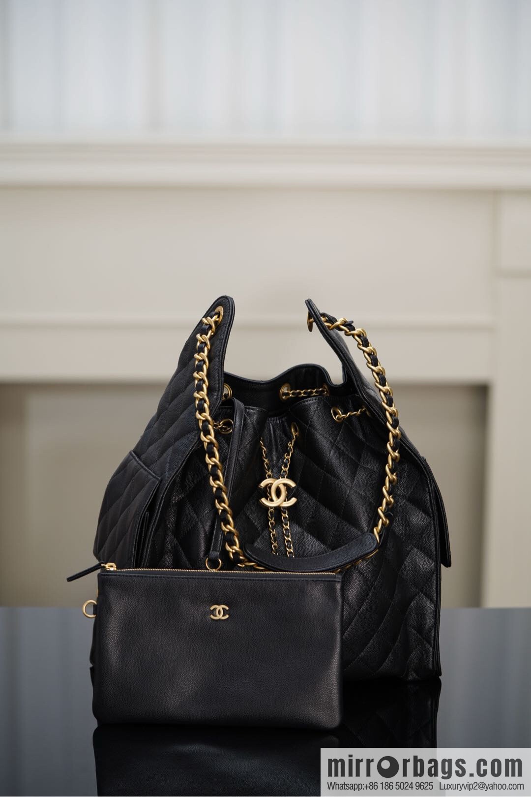 ππ‘ππ§ππ₯ πππ¬ π‘π¨ππ¨ πππ Drawstring Bucket Bag, Black Gold Caviar, Large βοΈ AS5311