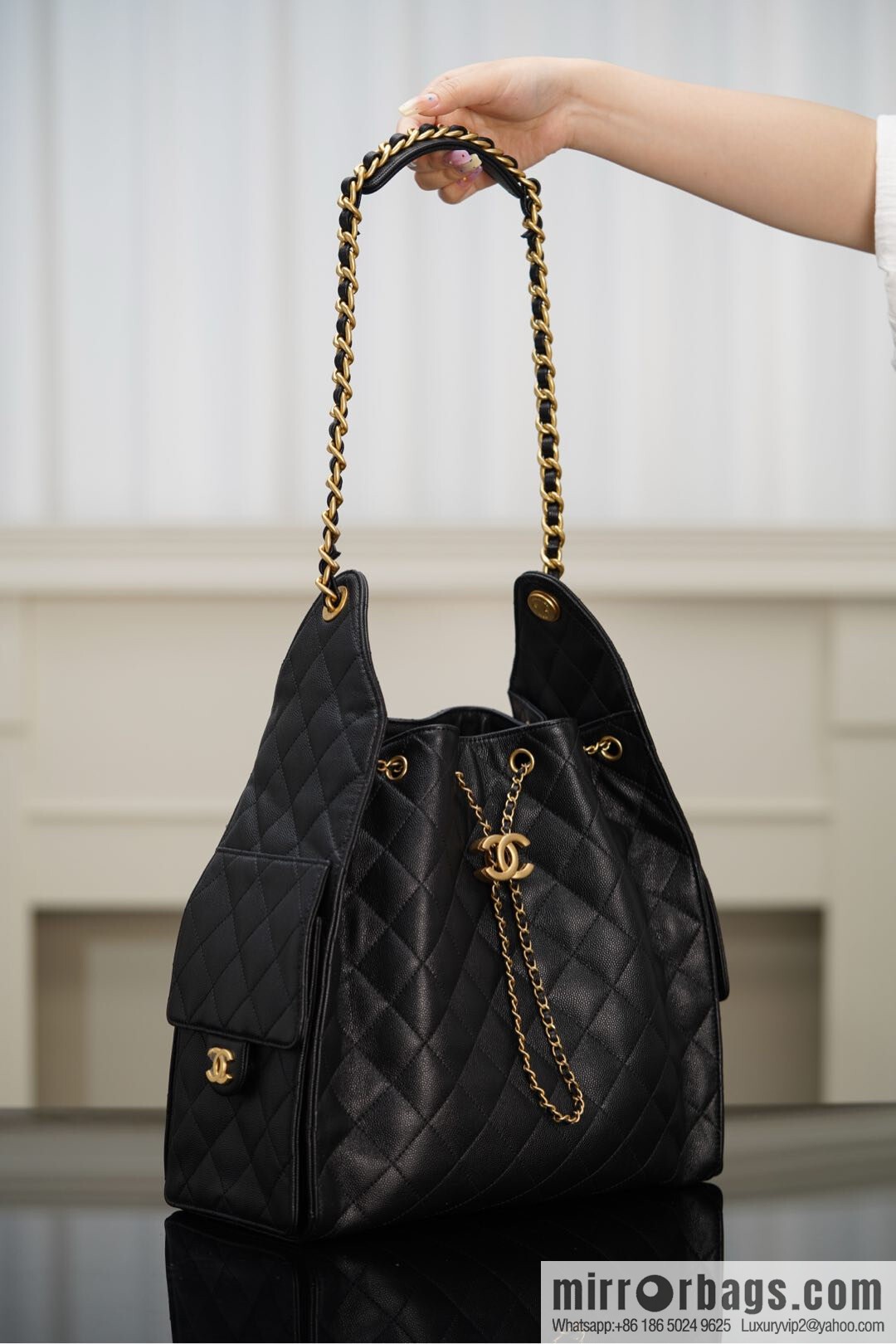 ππ‘ππ§ππ₯ πππ¬ π‘π¨ππ¨ πππ Drawstring Bucket Bag, Black Gold Caviar, Large βοΈ AS5311