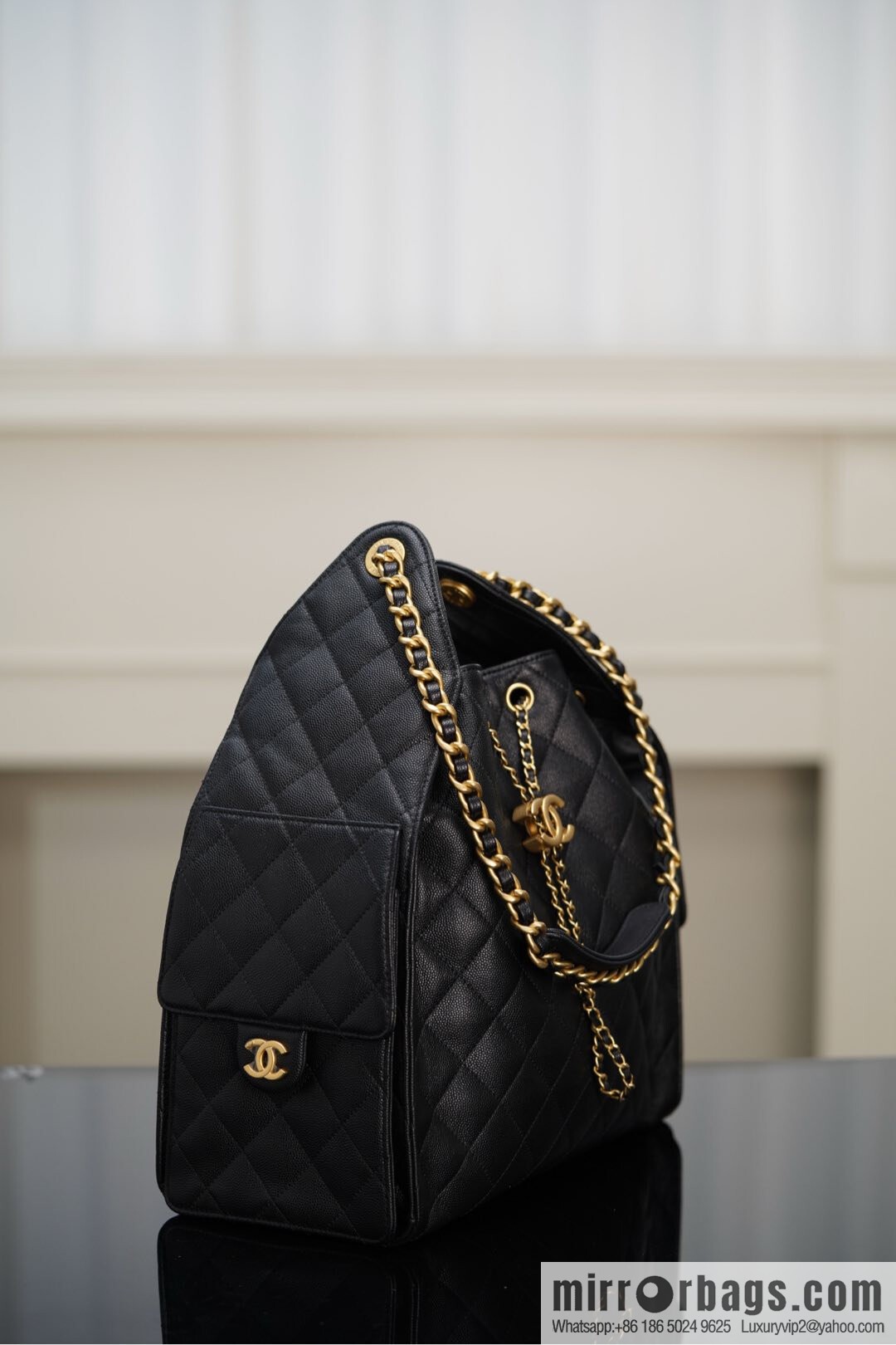 ππ‘ππ§ππ₯ πππ¬ π‘π¨ππ¨ πππ Drawstring Bucket Bag, Black Gold Caviar, Large βοΈ AS5311