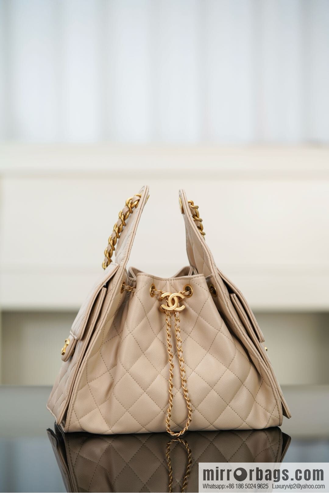 𝐂𝐡𝐚𝐧𝐞𝐥 𝟐𝟓𝐬 𝐬𝐦𝐚𝐥𝐥 𝐡𝐨𝐛𝐨 Drawstring Bucket Bag, Apricot Caviar, Small ✔️ AS5293