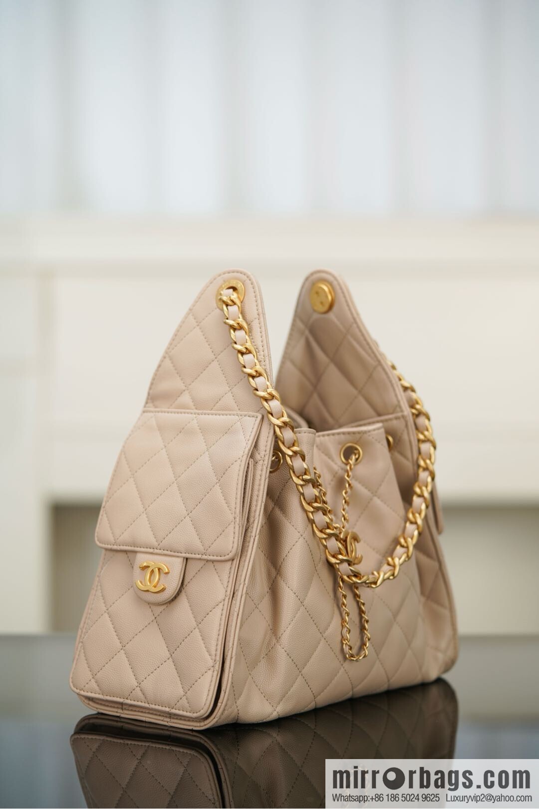 𝐂𝐡𝐚𝐧𝐞𝐥 𝟐𝟓𝐬 𝐬𝐦𝐚𝐥𝐥 𝐡𝐨𝐛𝐨 Drawstring Bucket Bag, Apricot Caviar, Small ✔️ AS5293