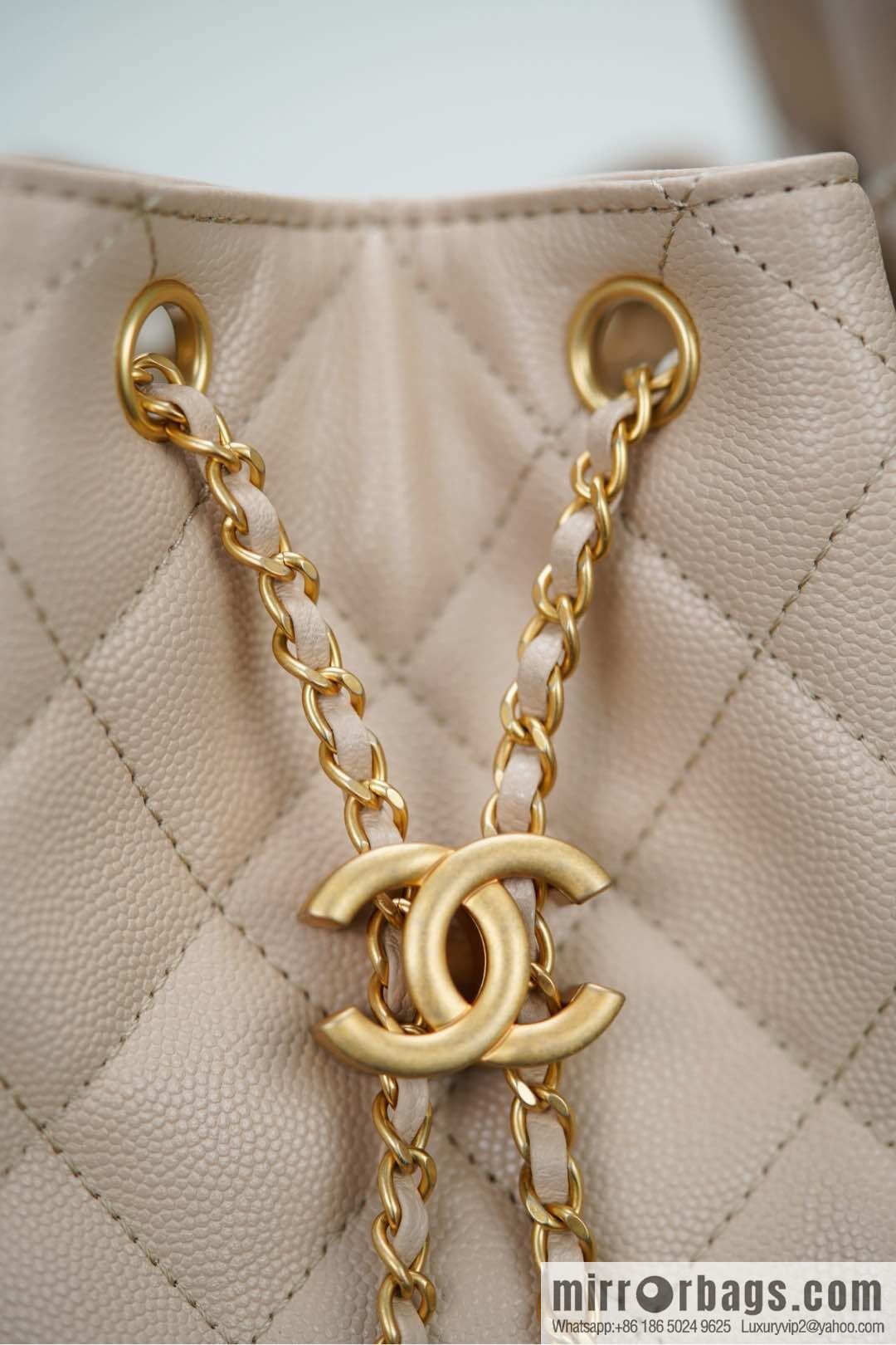 𝐂𝐡𝐚𝐧𝐞𝐥 𝟐𝟓𝐬 𝐬𝐦𝐚𝐥𝐥 𝐡𝐨𝐛𝐨 Drawstring Bucket Bag, Apricot Caviar, Small ✔️ AS5293