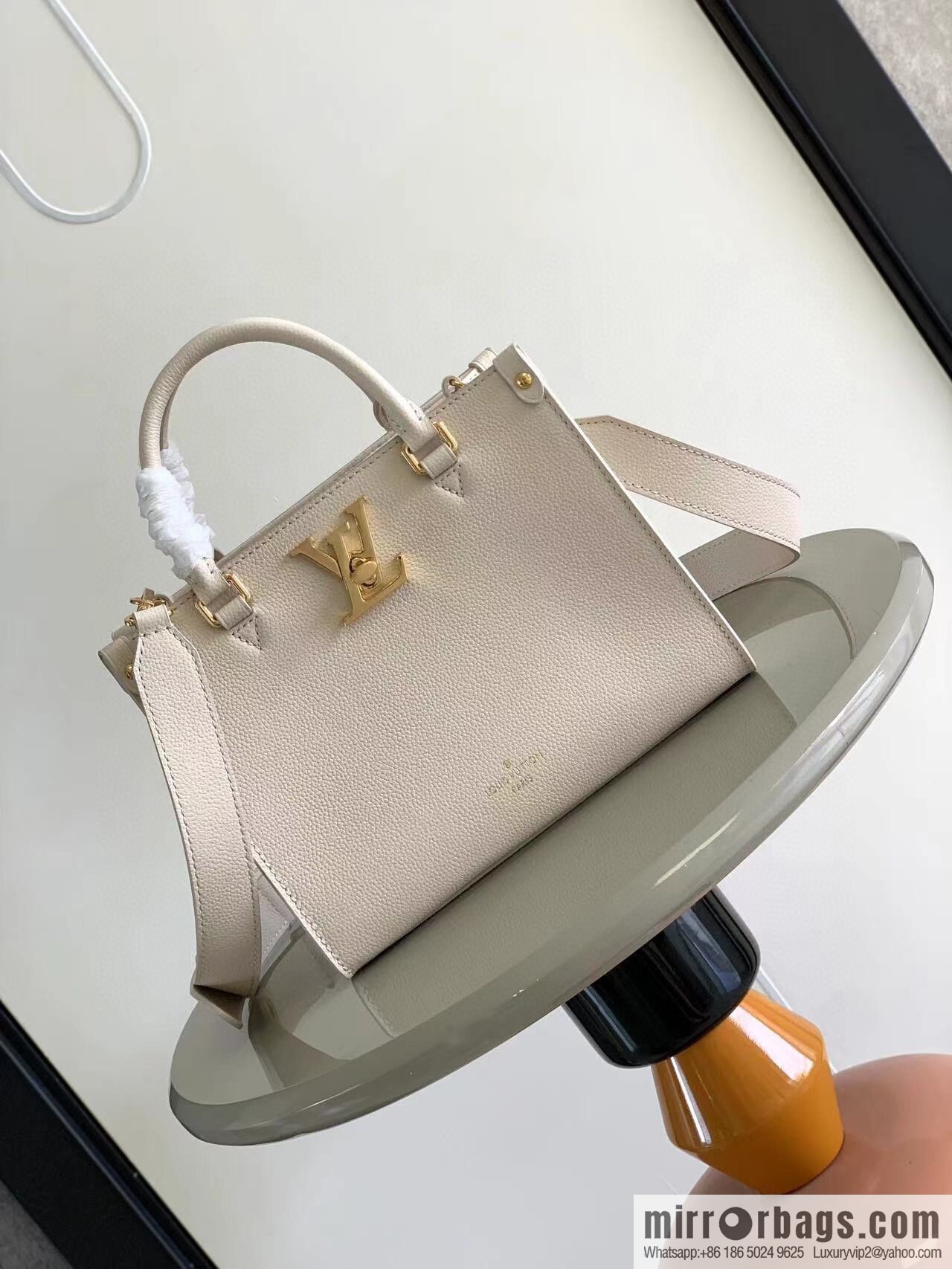 LV M23637 LOCK & GO handbag
