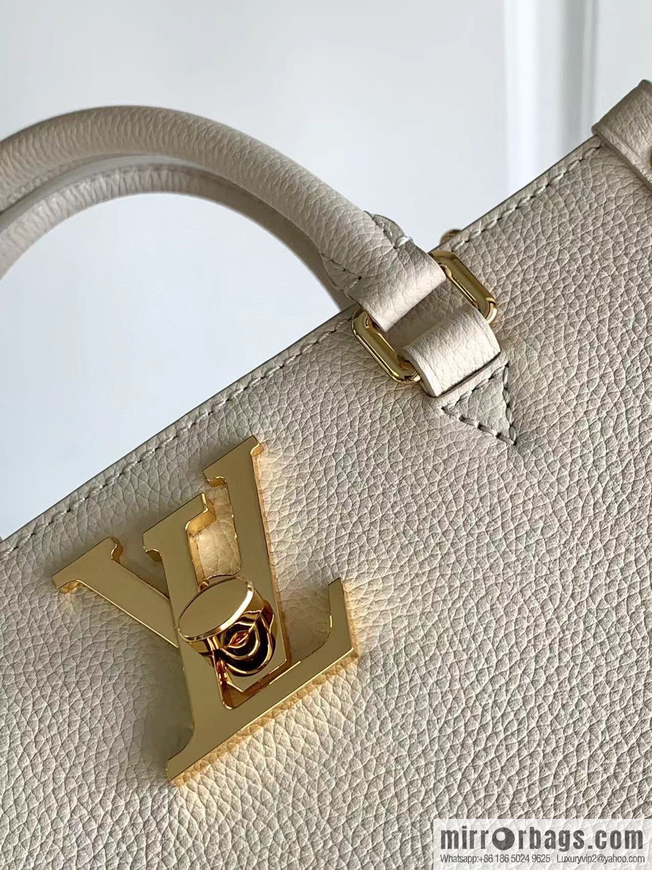 LV M23637 LOCK & GO handbag