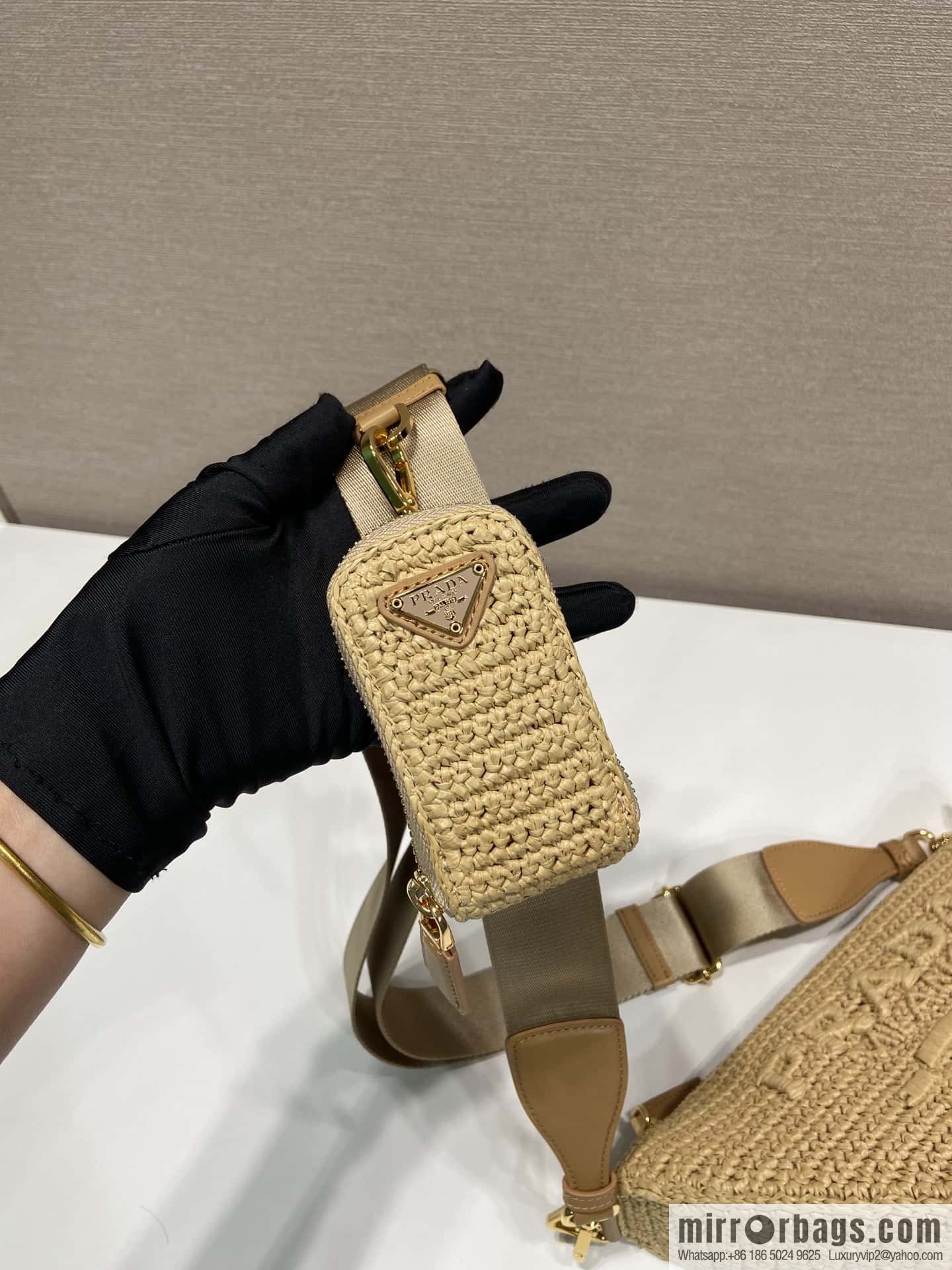 PRADA Prada hand-woven triangle bag 1BH190