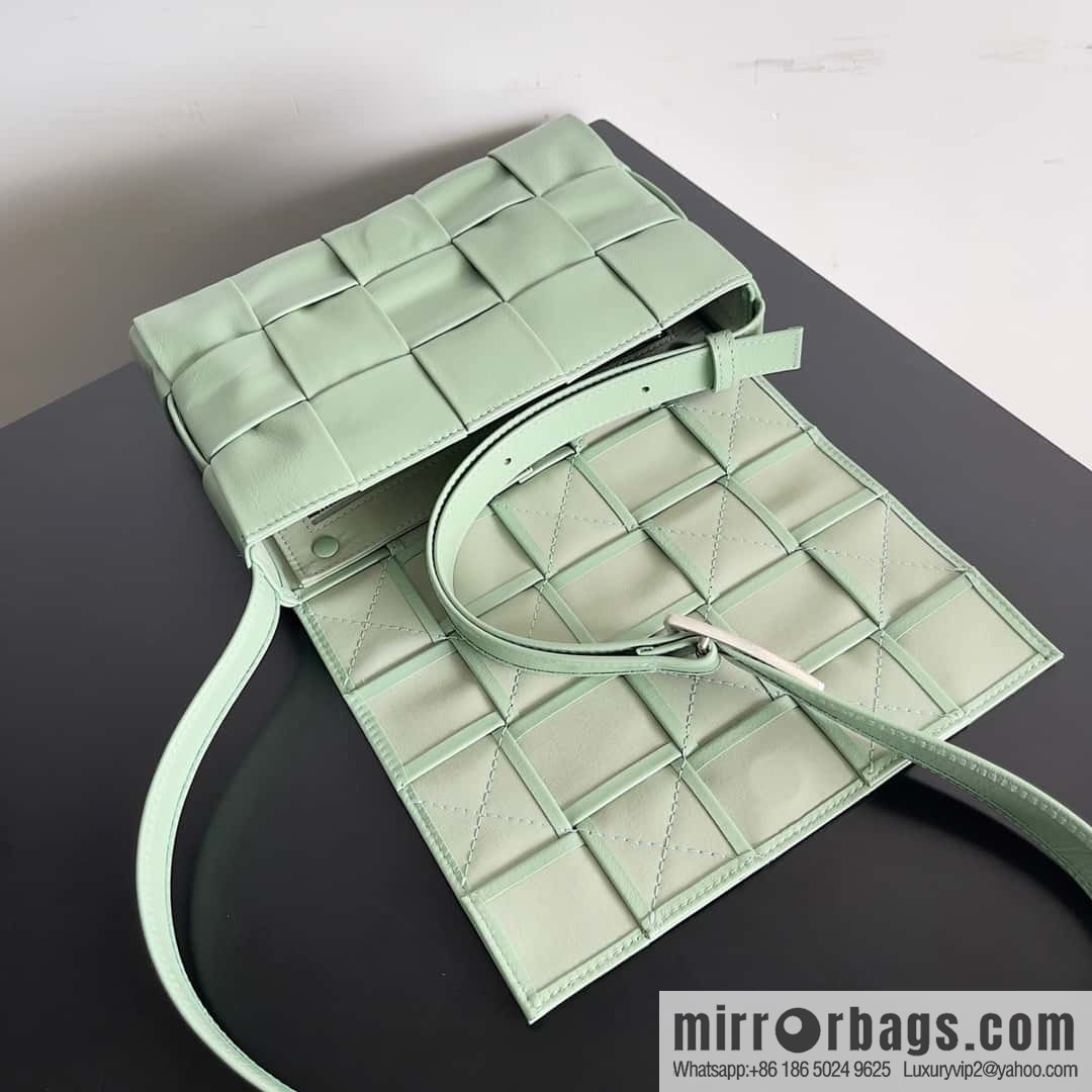 Highest end: Bottega Veneta Cassette/Pillow Bag Model: 667298 Sage Green
