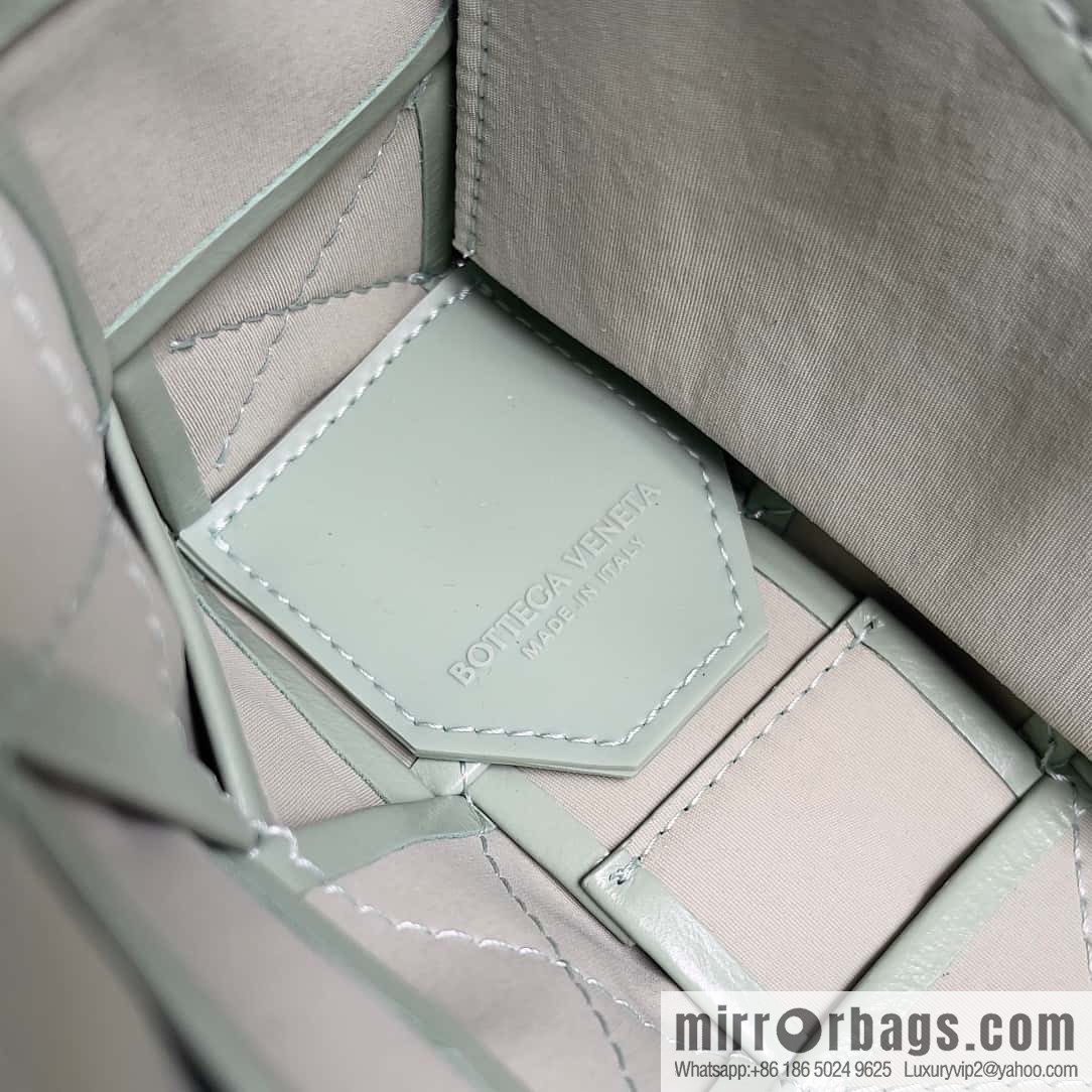 Highest end: Bottega Veneta Cassette/Pillow Bag Model: 667298 Sage Green