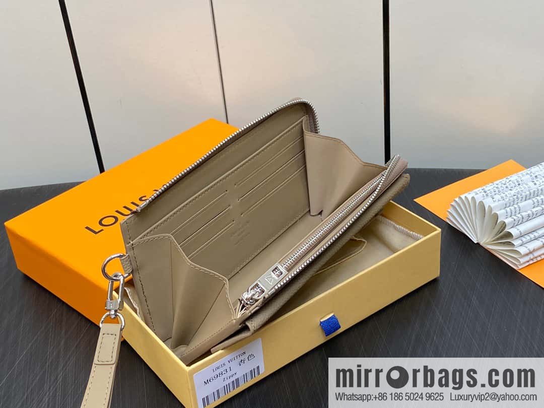 [Original single boutique] M69831 apricot, full leather clutch bag wallet series NEW Aer long wallet
