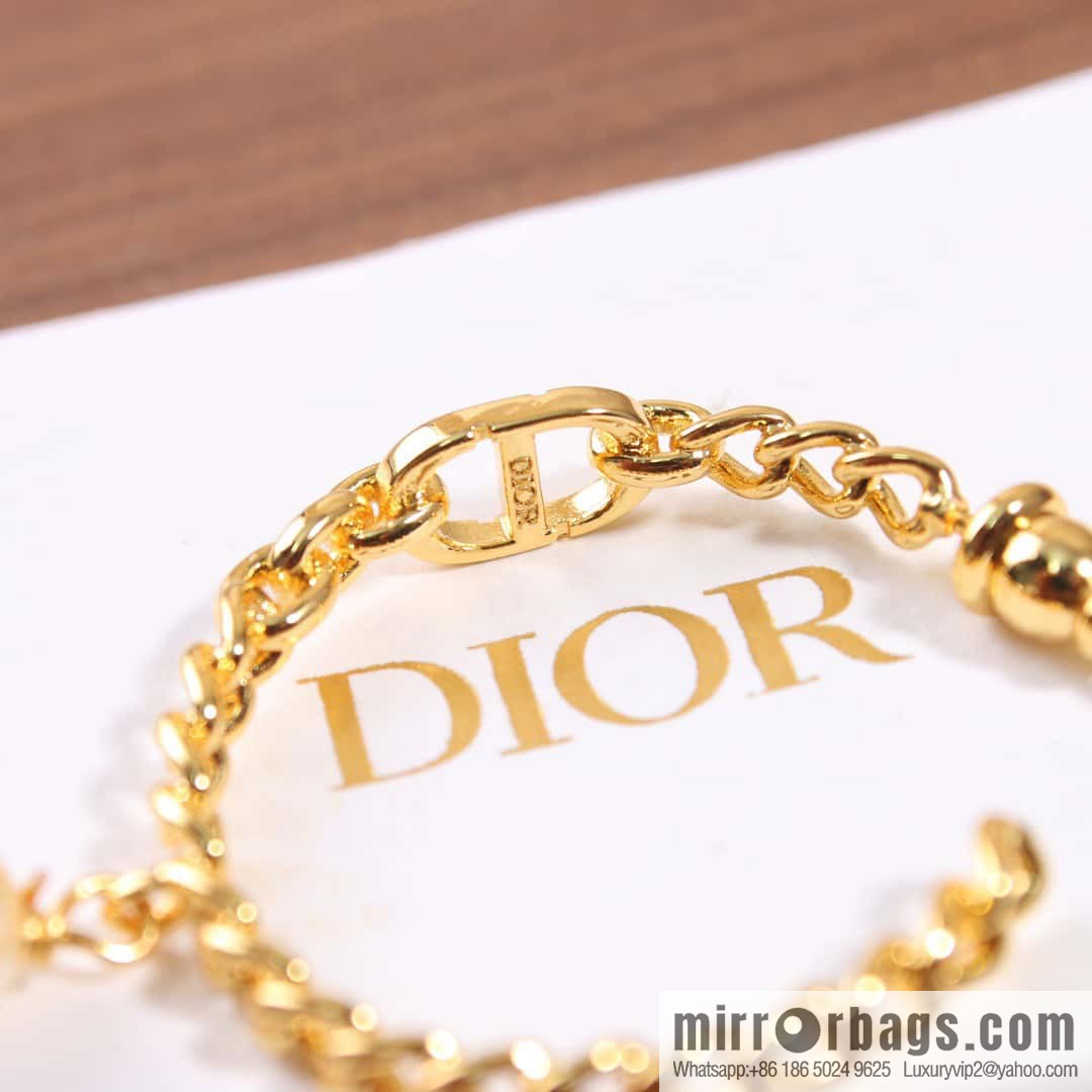 New ☑️ DIOR gold CD pearl stud earrings