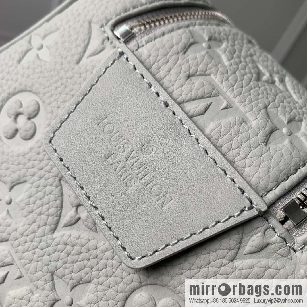 M82576 Gray and white, this Dopp Kit toilet bag.