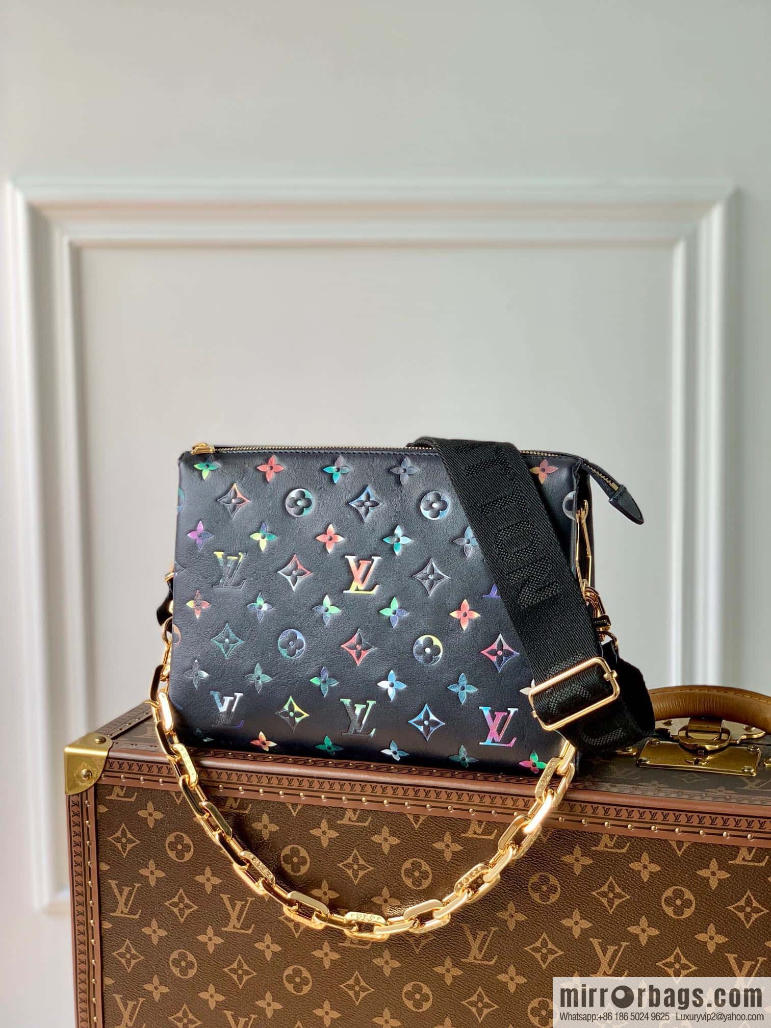 M21353 black color print, this Coussin small handbag