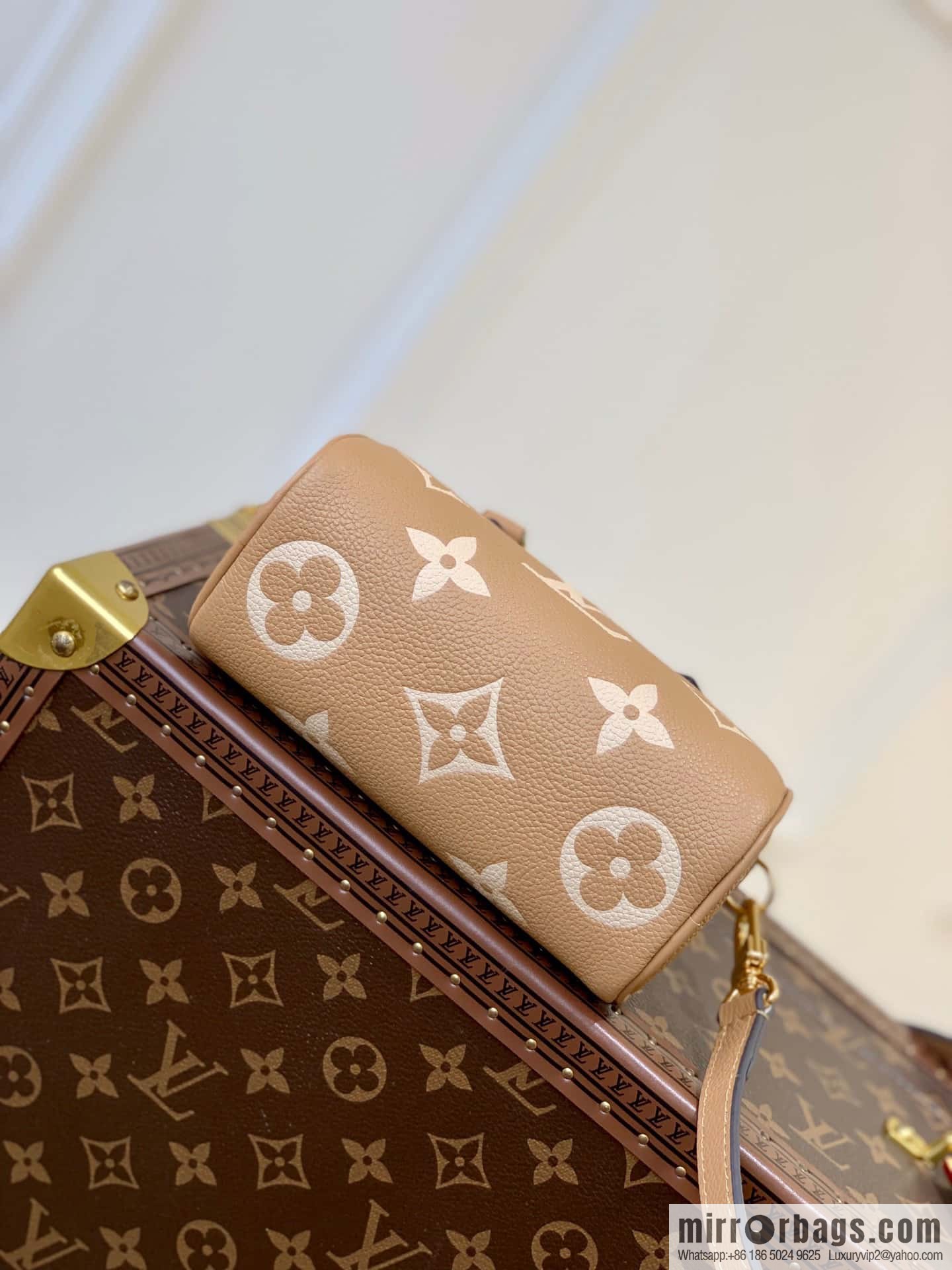 M81625 (Embossed silk screen) Nano Speedy handbag