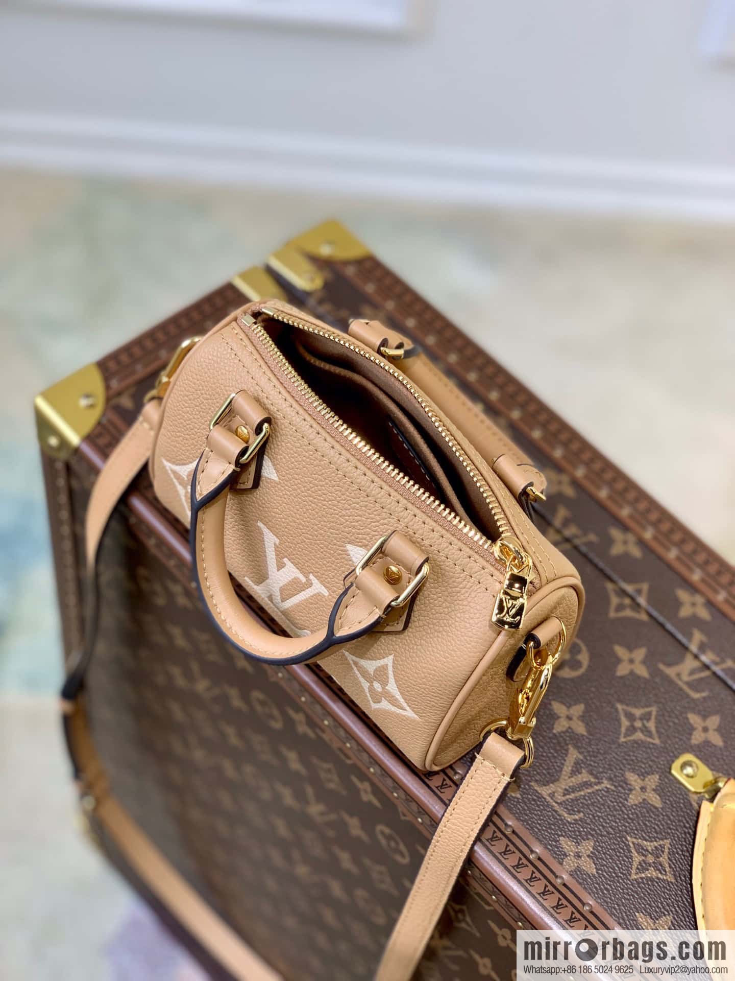 M81625 (Embossed silk screen) Nano Speedy handbag