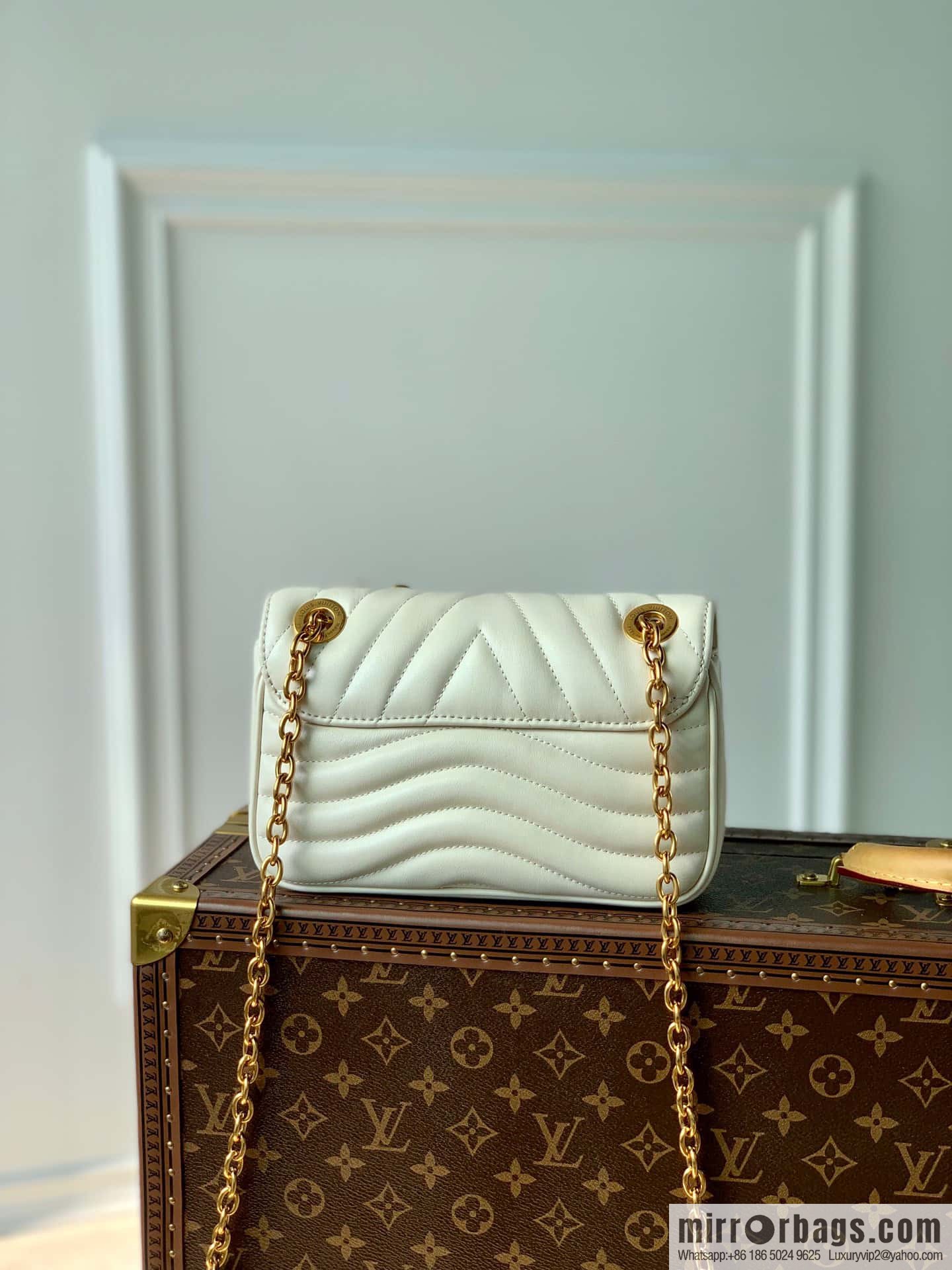 20685 New Wave small chain bag M56461 NEW WAVE MULTI-POCHETTE handbag