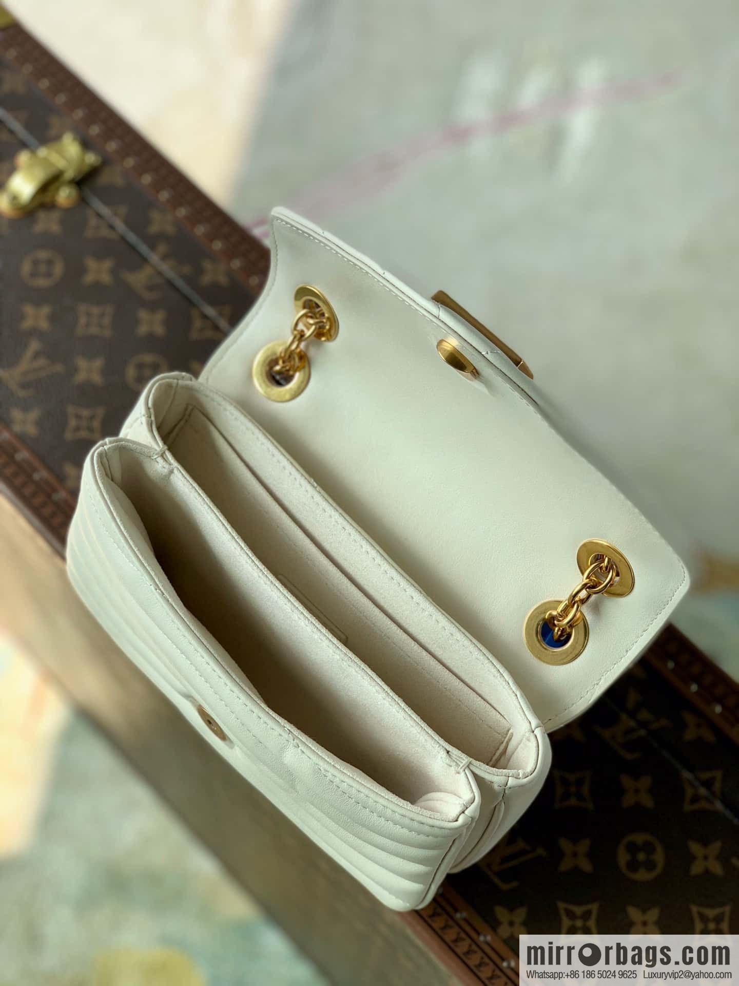 20685 New Wave small chain bag M56461 NEW WAVE MULTI-POCHETTE handbag