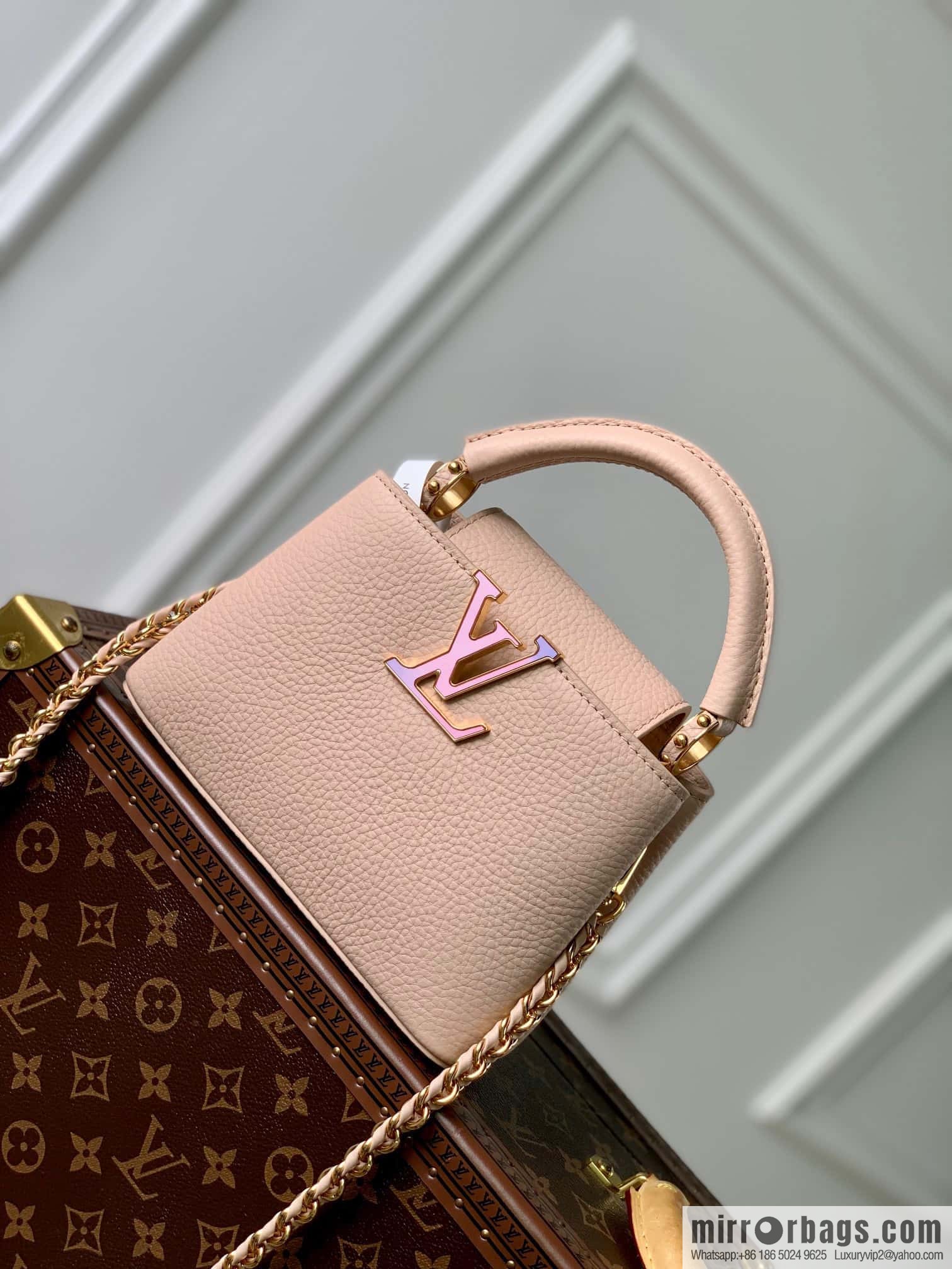 M23082 new CAPUCINES mini handbag of the season