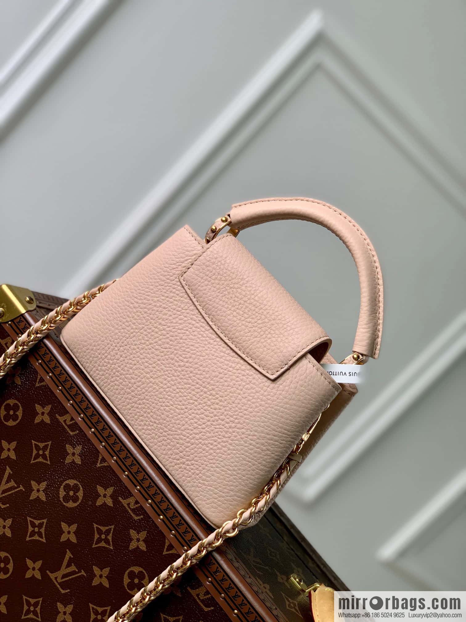 M23082 new CAPUCINES mini handbag of the season