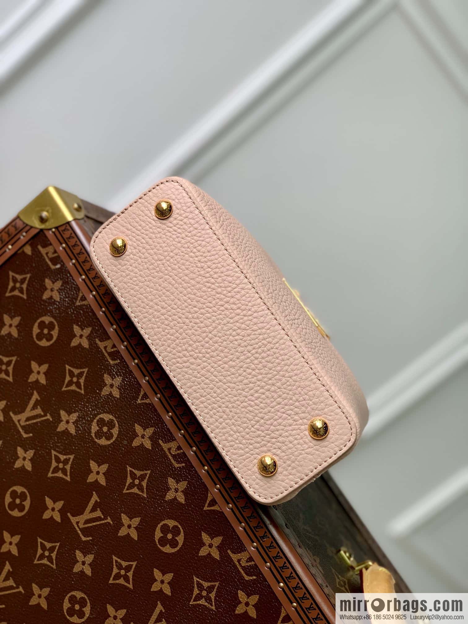 M23082 new CAPUCINES mini handbag of the season