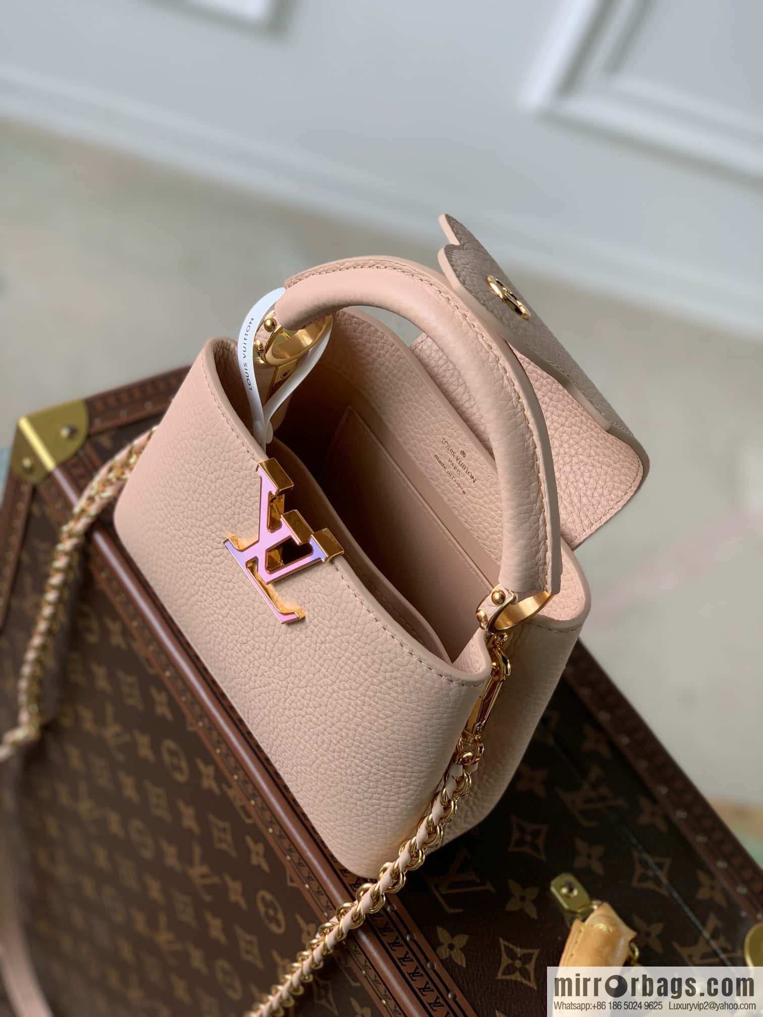 M23082 new CAPUCINES mini handbag of the season