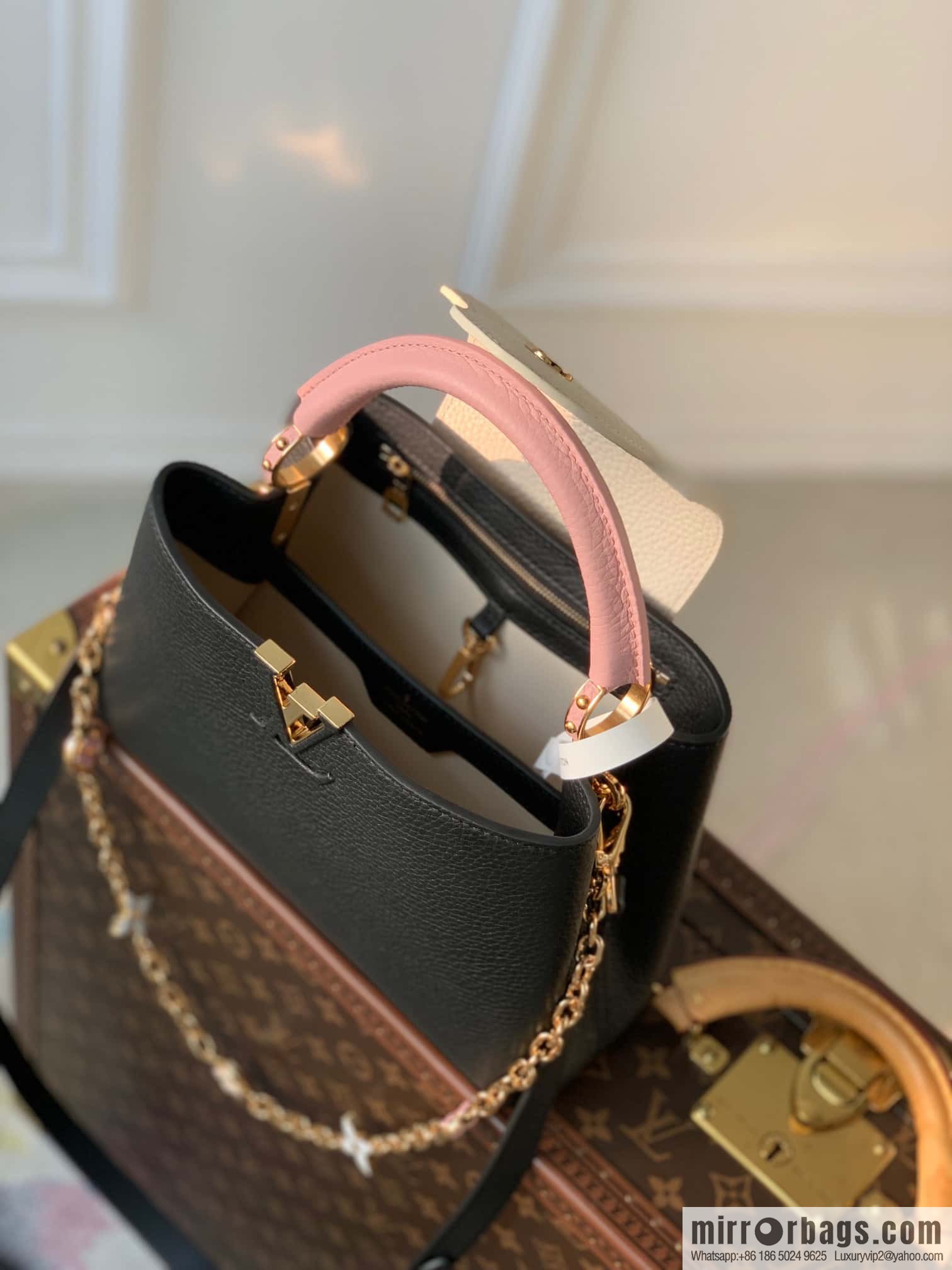 M22375 black small, this Capucines small handbag.