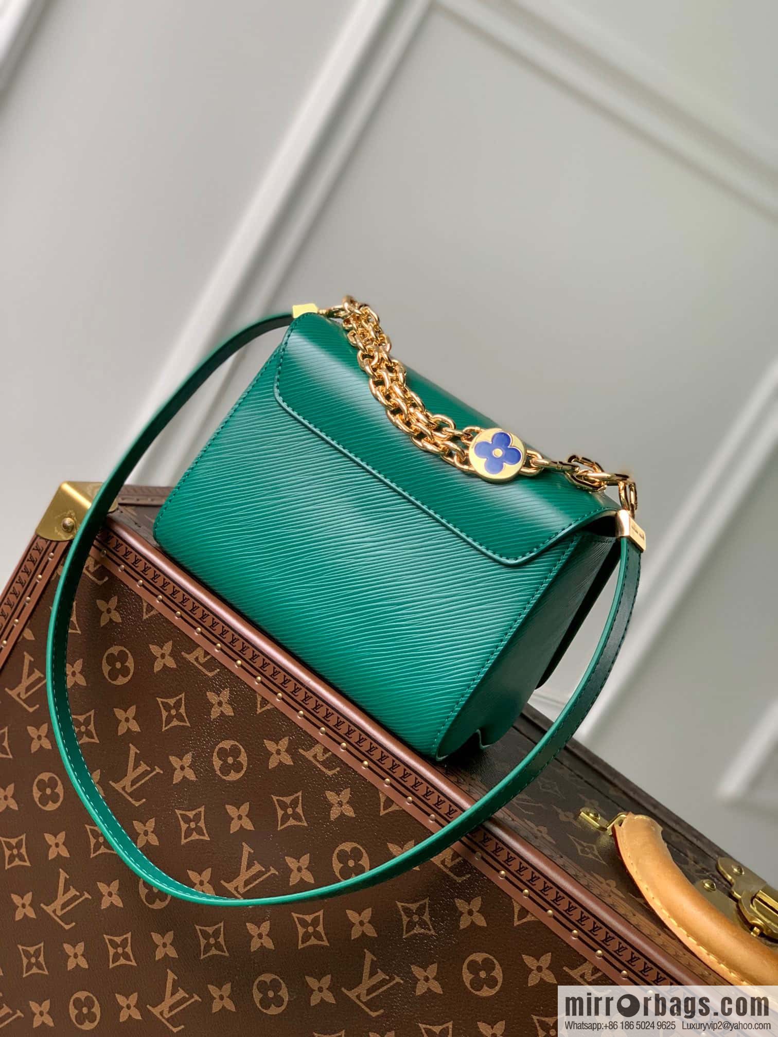 M21649 (50332 Green Jewelry) Twist Small Handbag M21649 TWIST Small Handbag