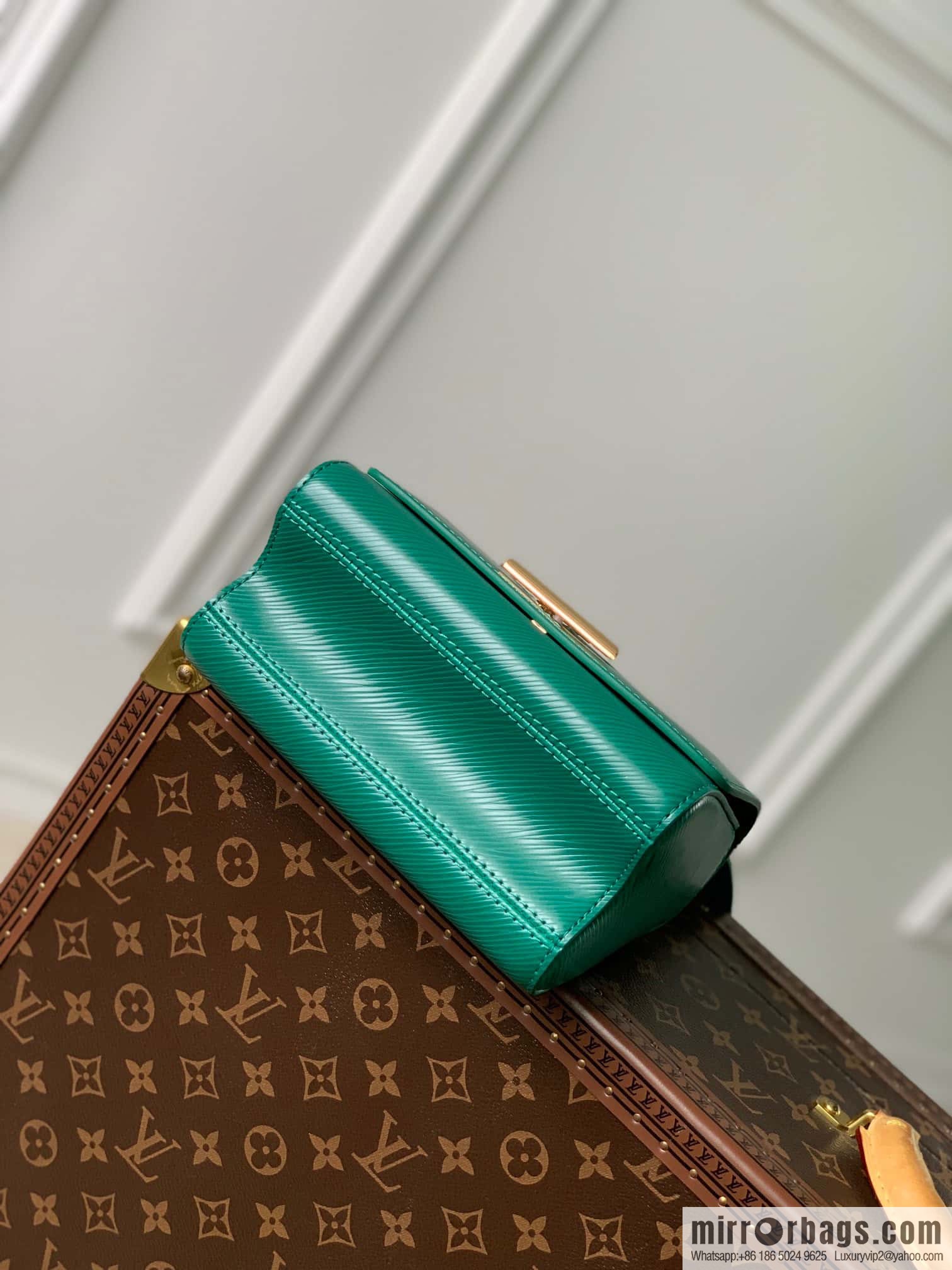 M21649 (50332 Green Jewelry) Twist Small Handbag M21649 TWIST Small Handbag