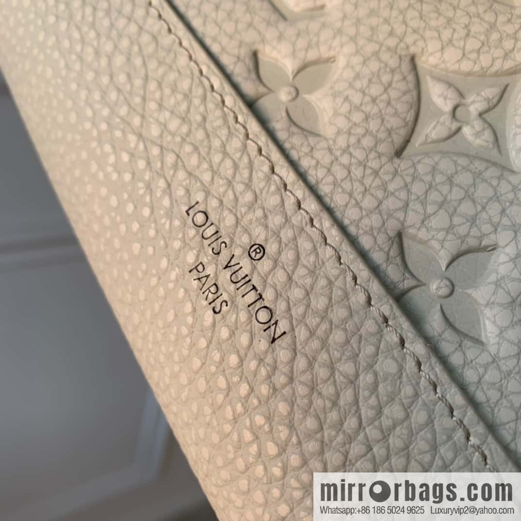 M81556 White clutch bag 1934 Louis Vuitton Sac Tricot handbag