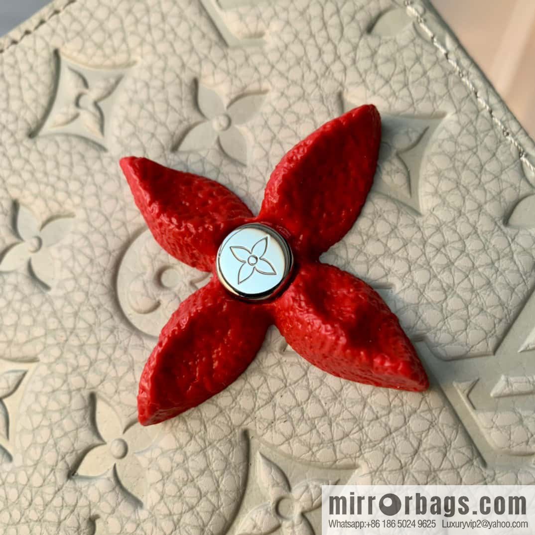 M81556 White clutch bag 1934 Louis Vuitton Sac Tricot handbag