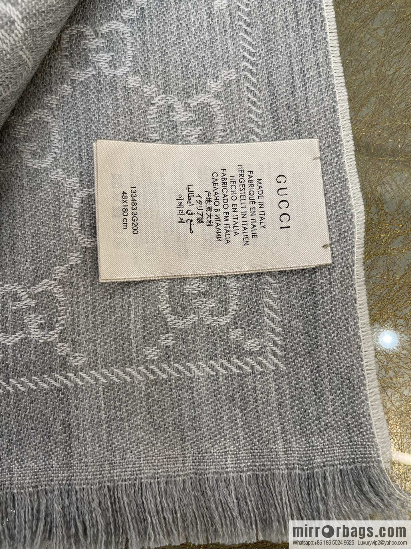 GUCCI Gucci GG Jacquard pattern knitted wool scarf 133483