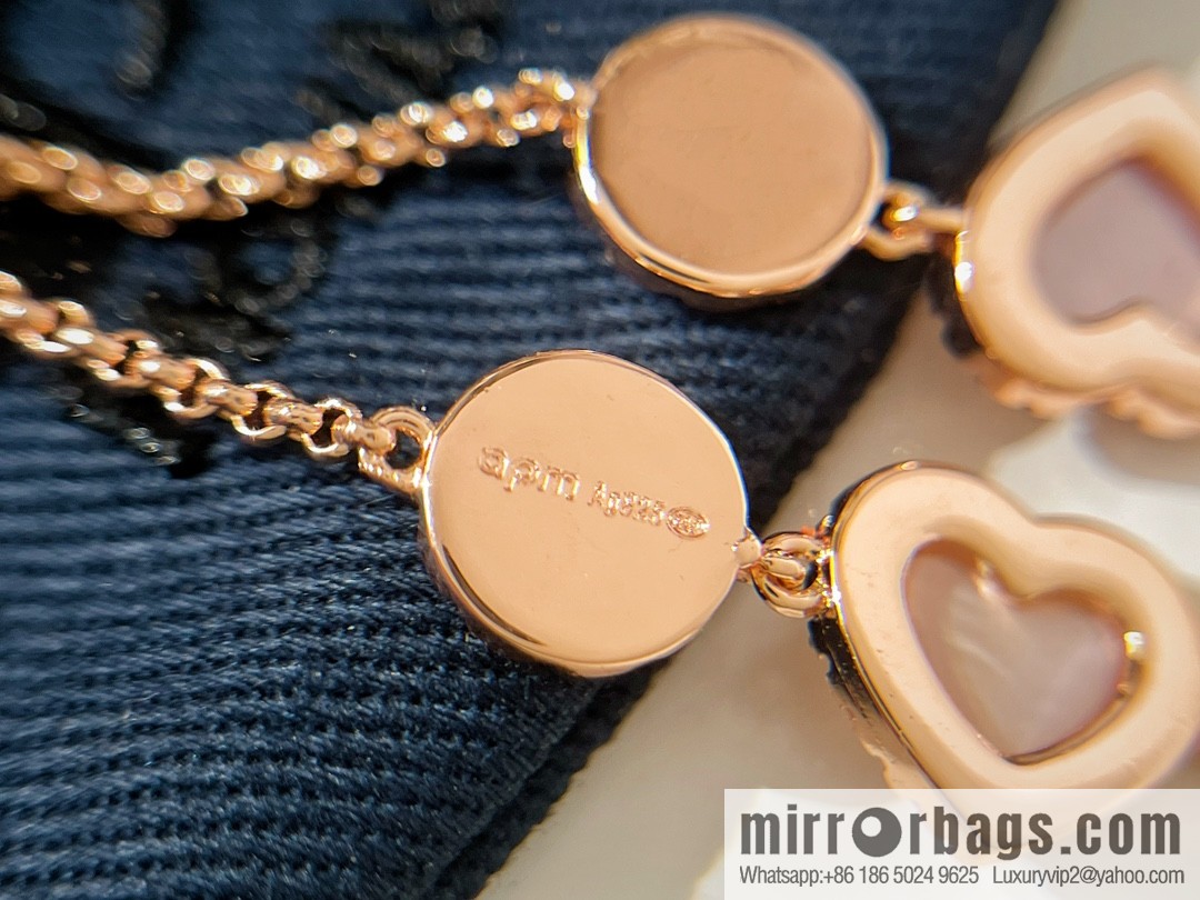 APM Monaco pink mother shell heart connected adjustable bracelet