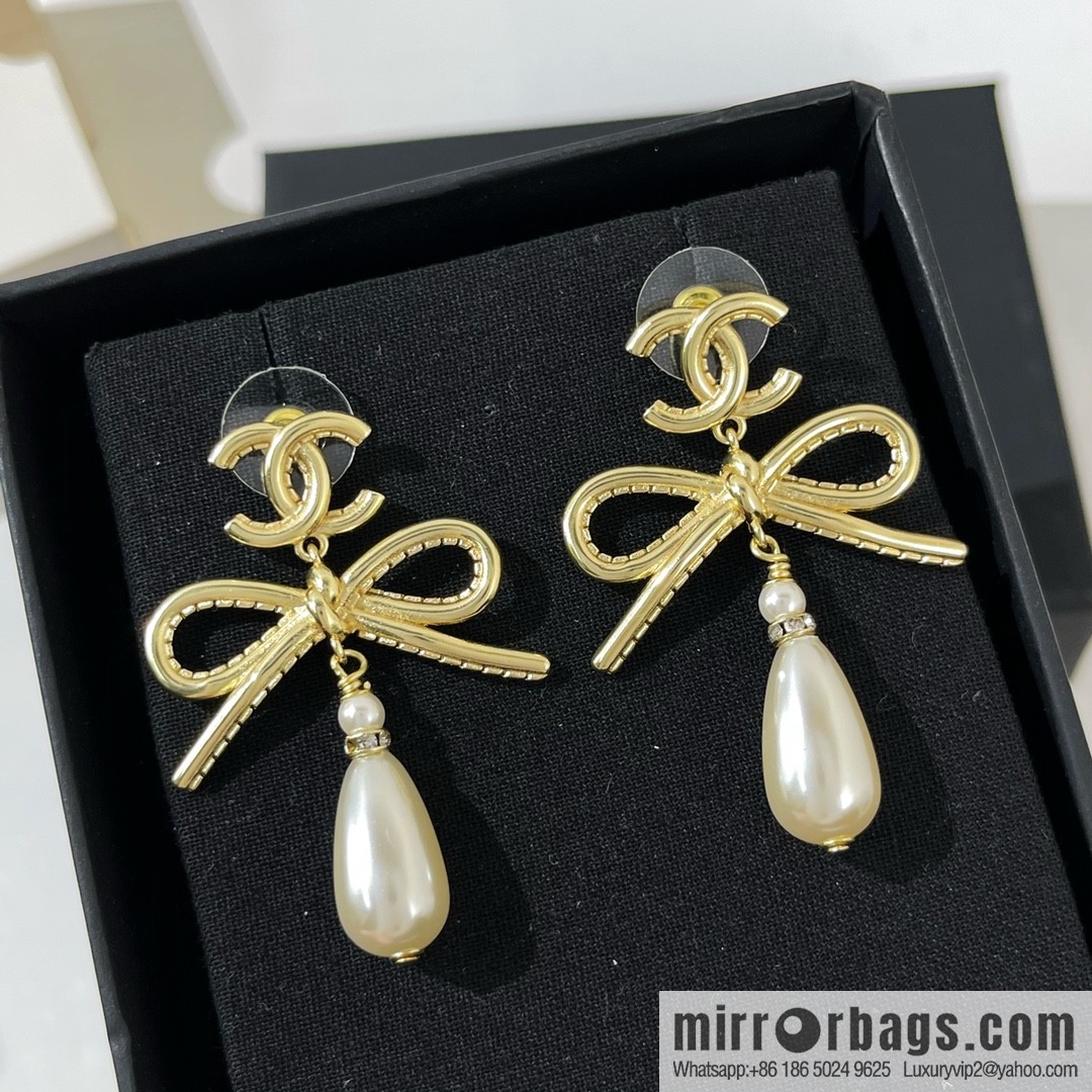 New ☑️ CHANEL Chanel double c bow, pearl, stud earrings