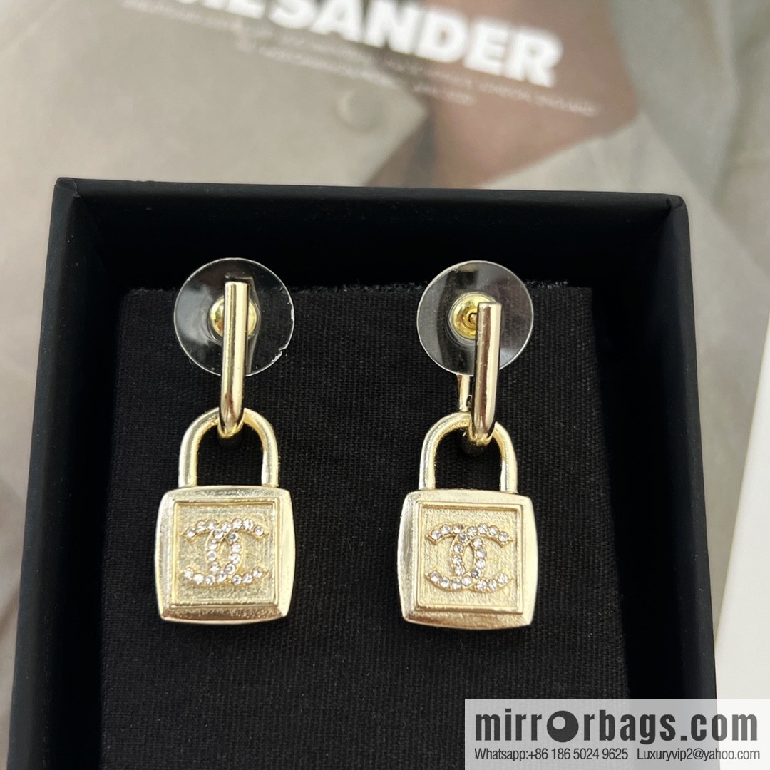New ☑️ CHANEL Chanel gold double c lock stud earrings
