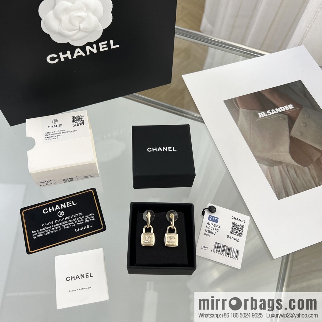 New ☑️ CHANEL Chanel gold double c lock stud earrings