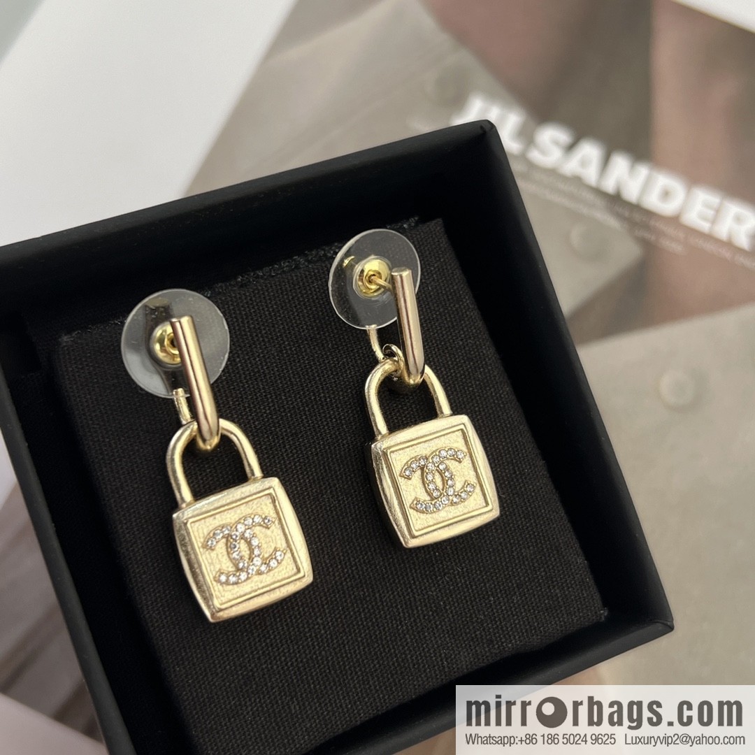 New ☑️ CHANEL Chanel gold double c lock stud earrings