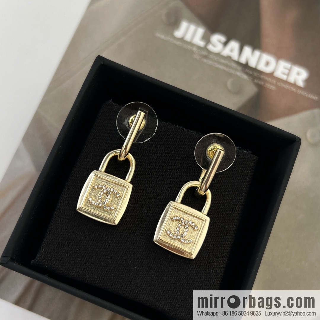 New ☑️ CHANEL Chanel gold double c lock stud earrings