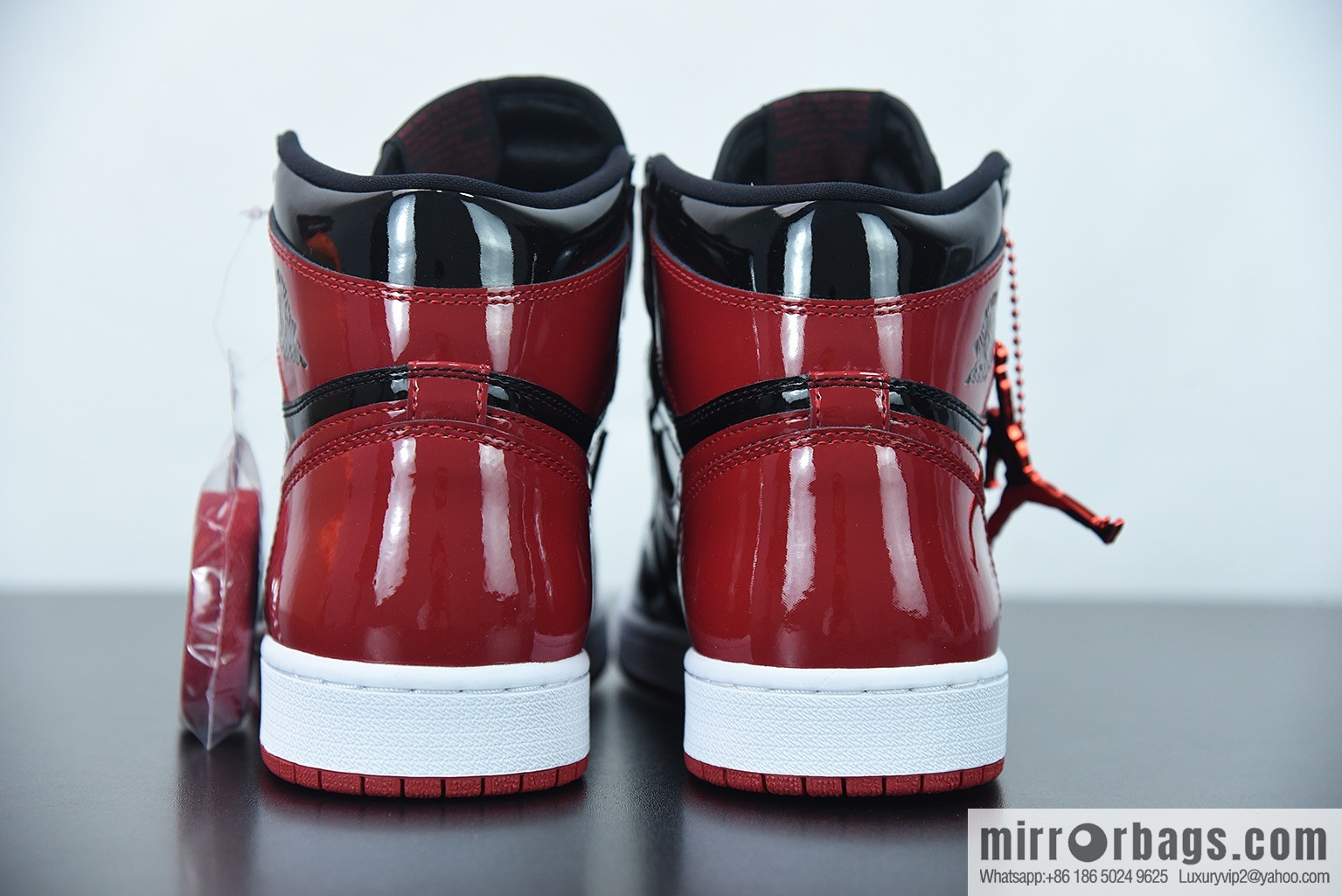 Air Jordan 1 AJ1 Jordan 1st generation high-top basketball shoes/patent leather black and red, prohibited, item number: 555088-063
